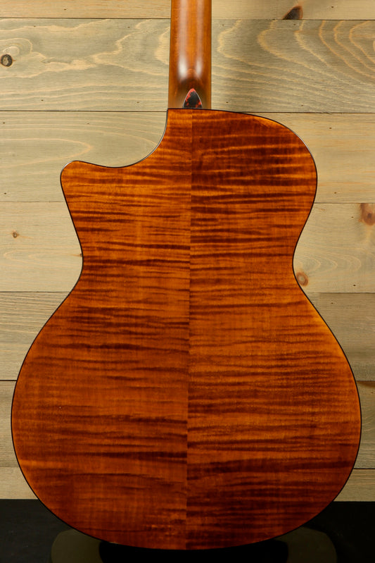 Eastman acoustic guitar back view showing stunning flamed wood finish in rich brown tones
