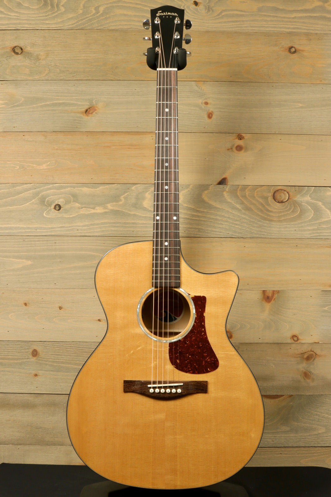 Eastman AC622 natural finish, front view of acoustic electric guitar with rosewood pickguard