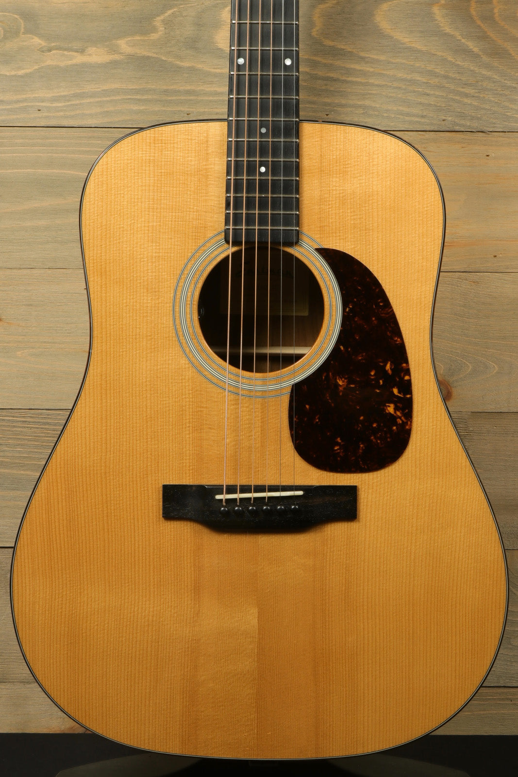 Eastman E10D-TC acoustic electric guitar with natural finish, front view