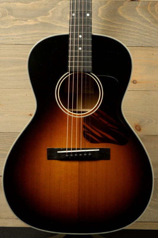 Eastman E10OOSS-TC acoustic guitar in sunburst finish with smooth body and intricate detailing