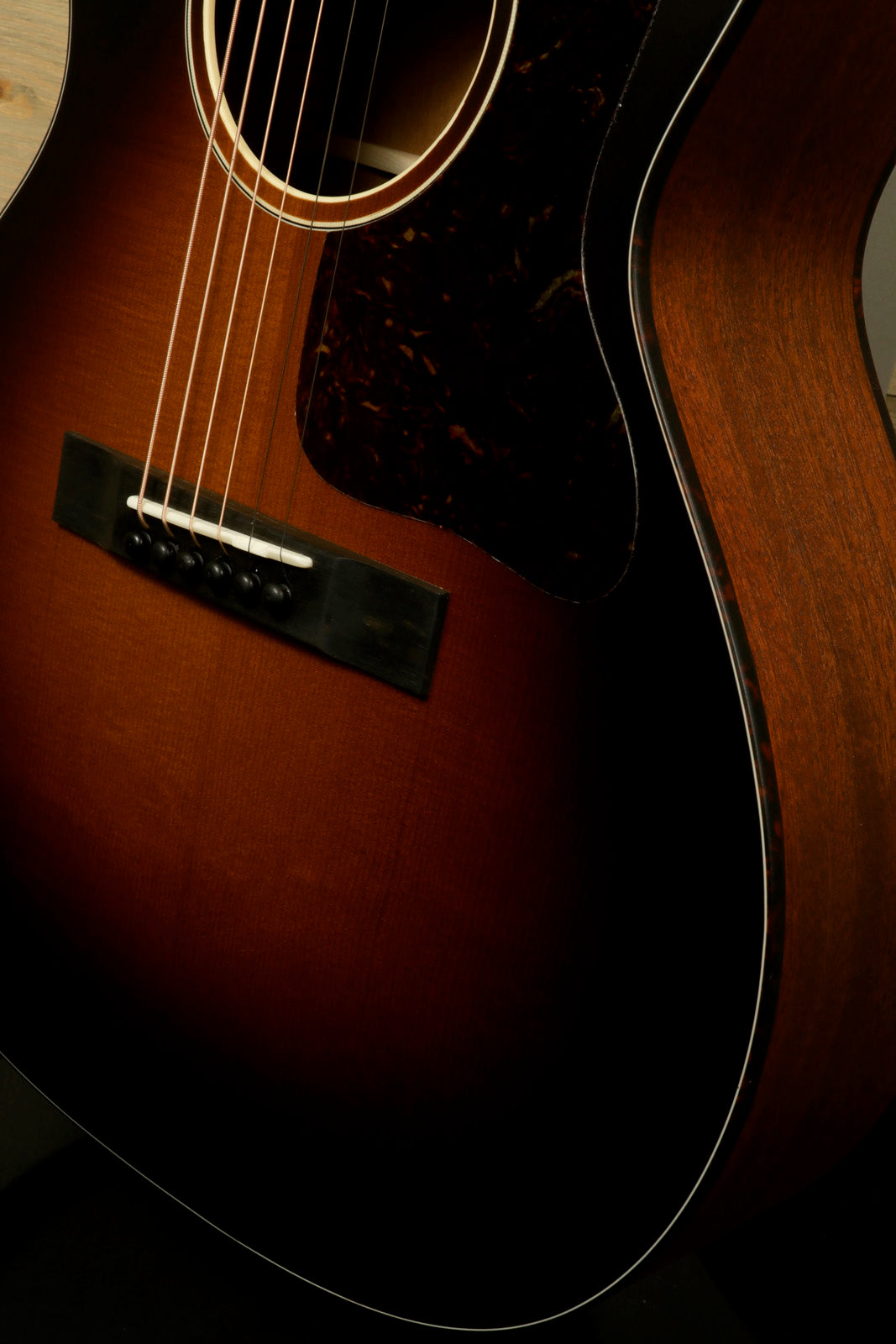 Eastman E10OOSS/v Classic Acoustic with Aged Look and Played In Feel showcasing a sunburst finish
