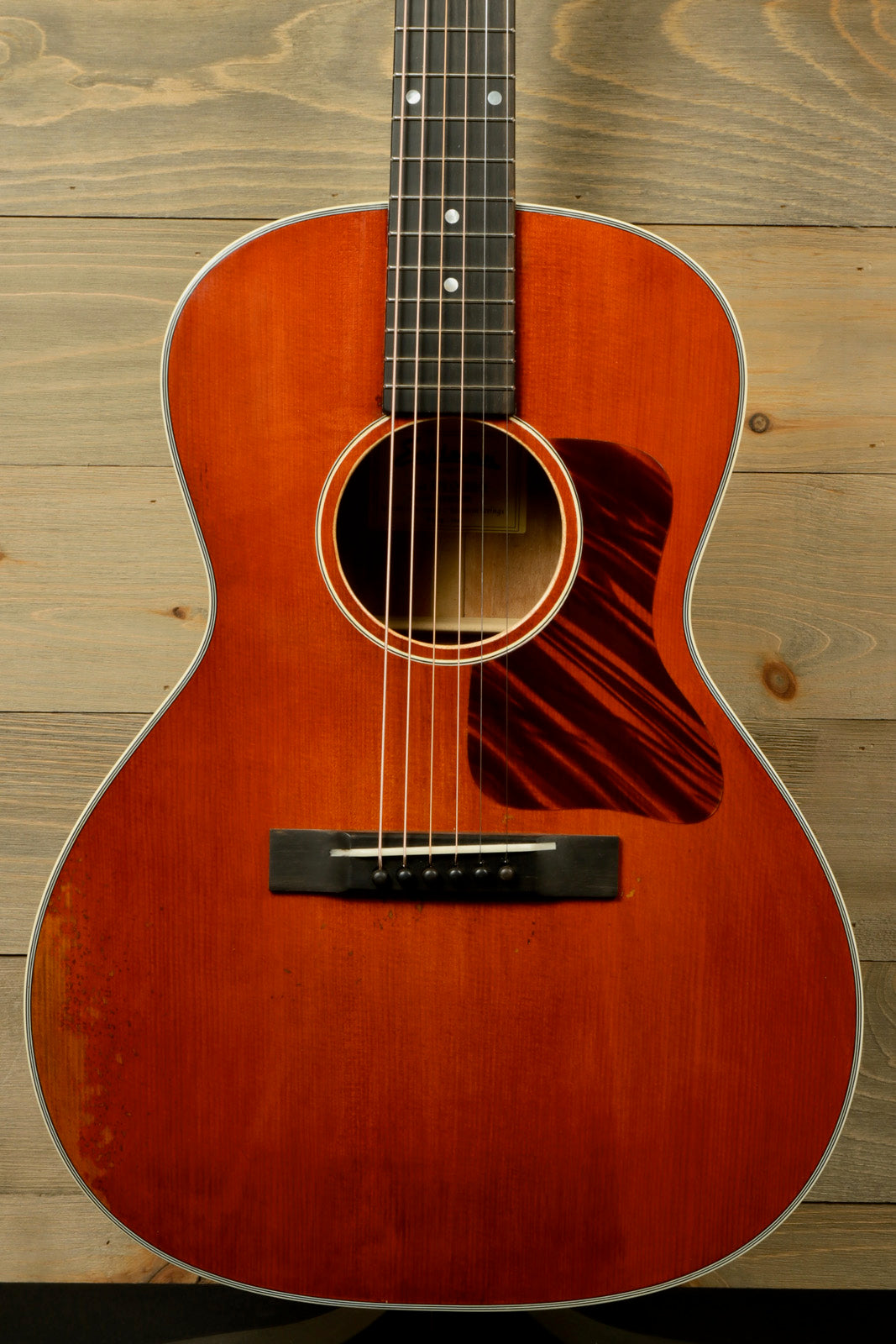 Eastman E10OOSS/v Classic Acoustic with Aged Look and Played In Feel showcasing a beautiful mahogany finish