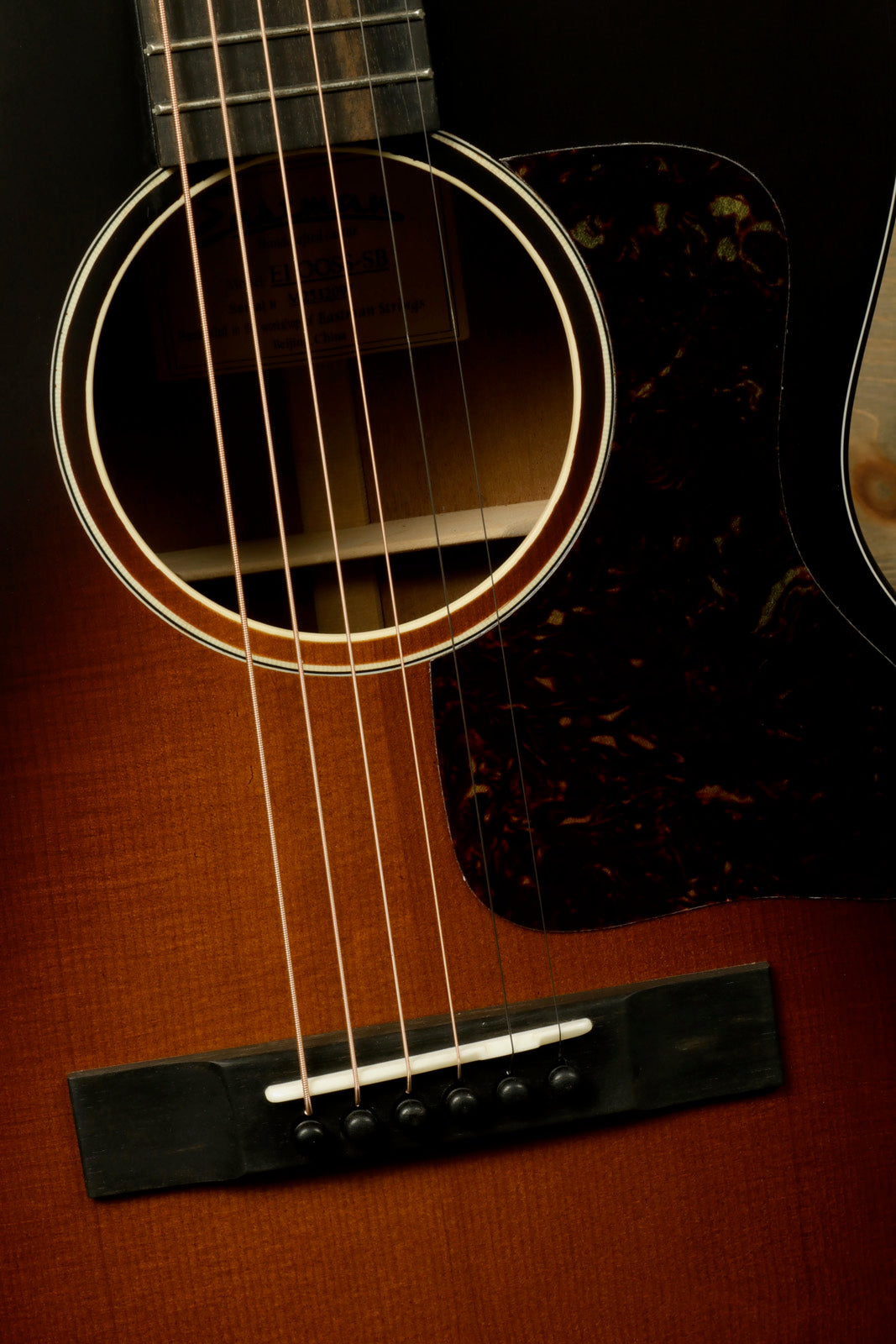 Eastman E10OOSS/v Classic Acoustic with Aged Look and Played In Feel showcasing the body and strings