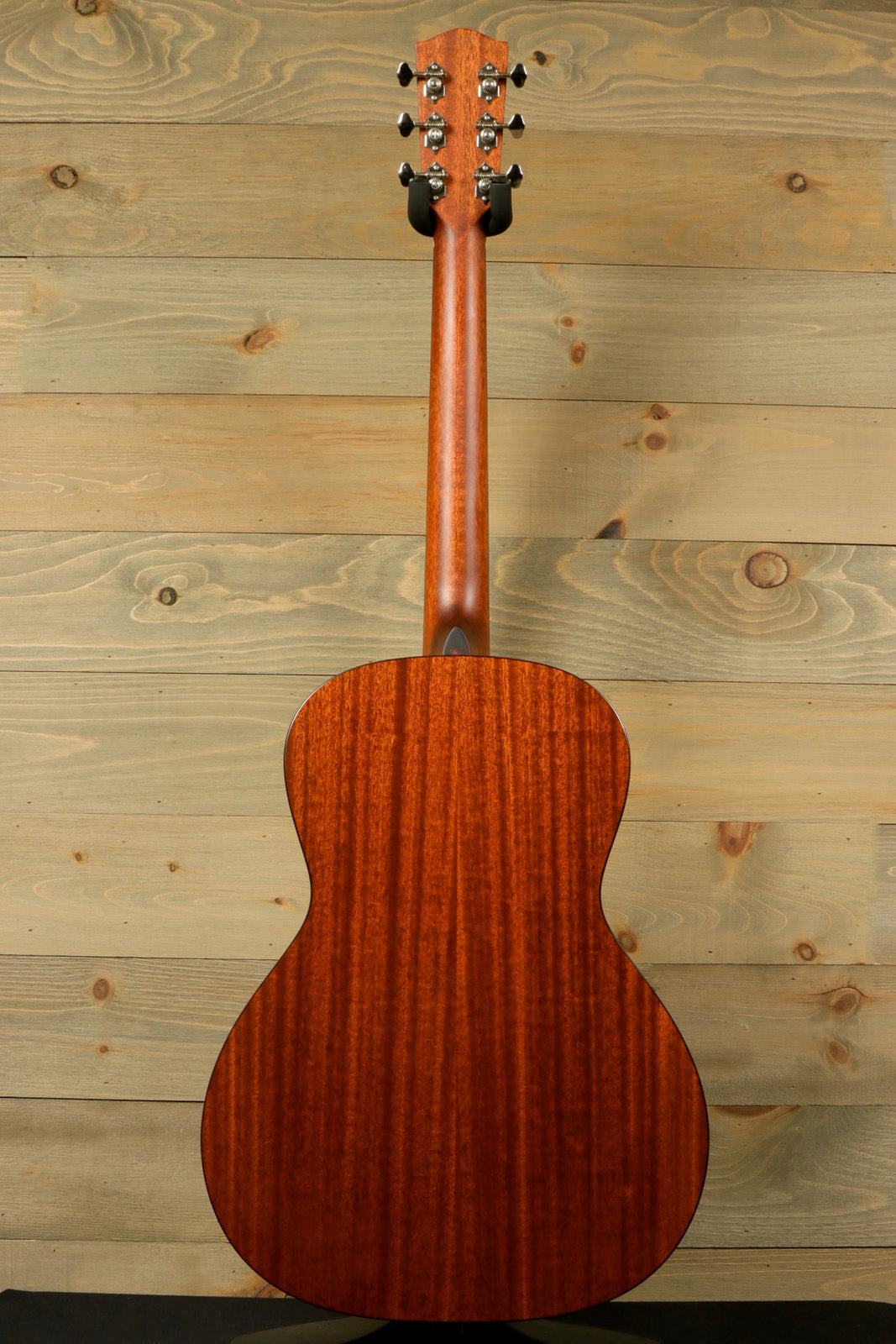 Eastman E1OOSS-DLX-SB acoustic guitar with a beautiful dark wood finish, back view