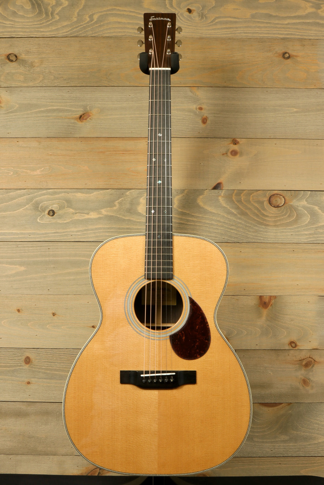 Eastman E8OM-TC acoustic guitar with a natural finish and classic design perfect for musicians