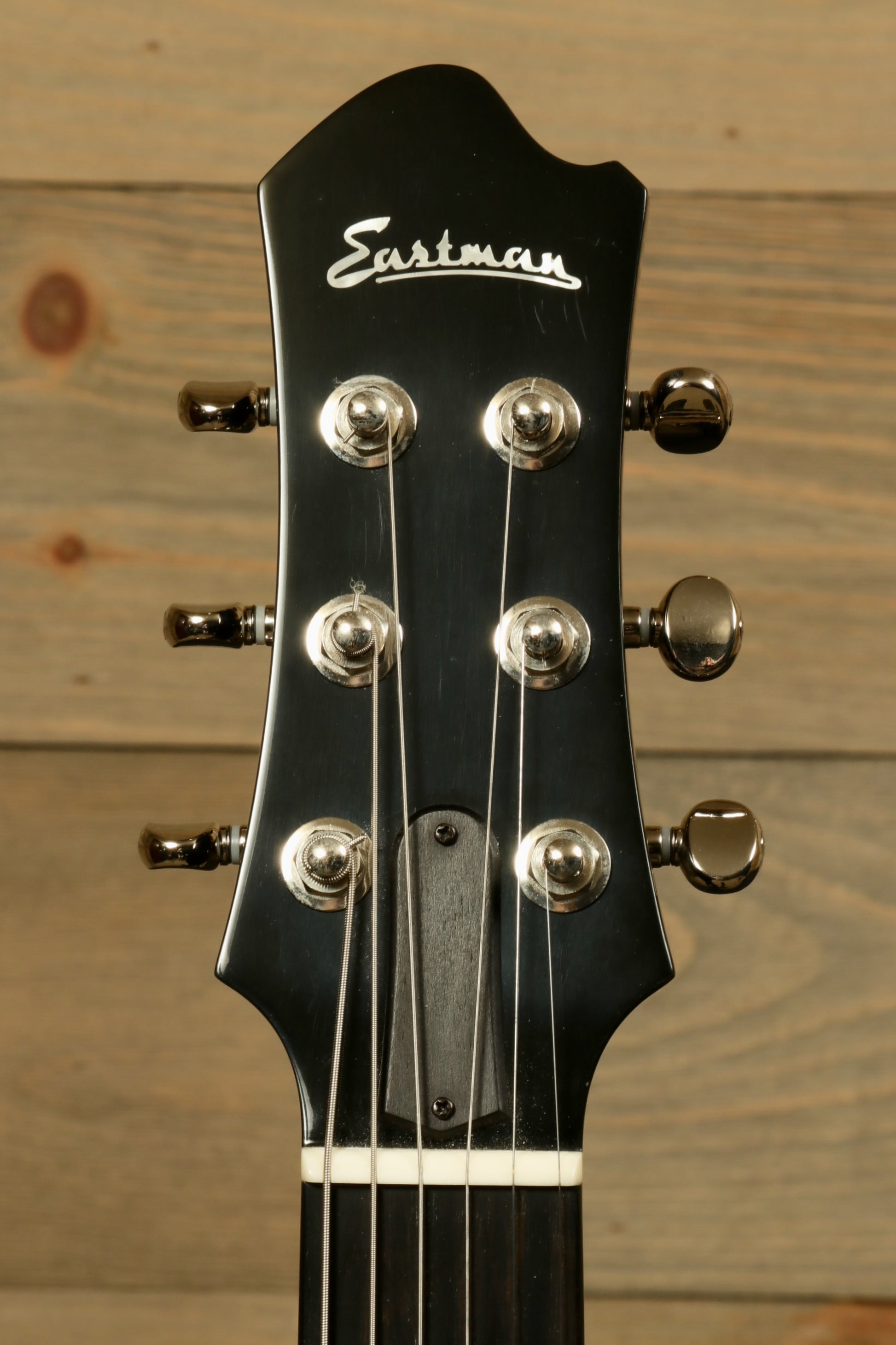 Eastman Electric Guitar with Hardshell Case, Black Finish - USED, headstock view
