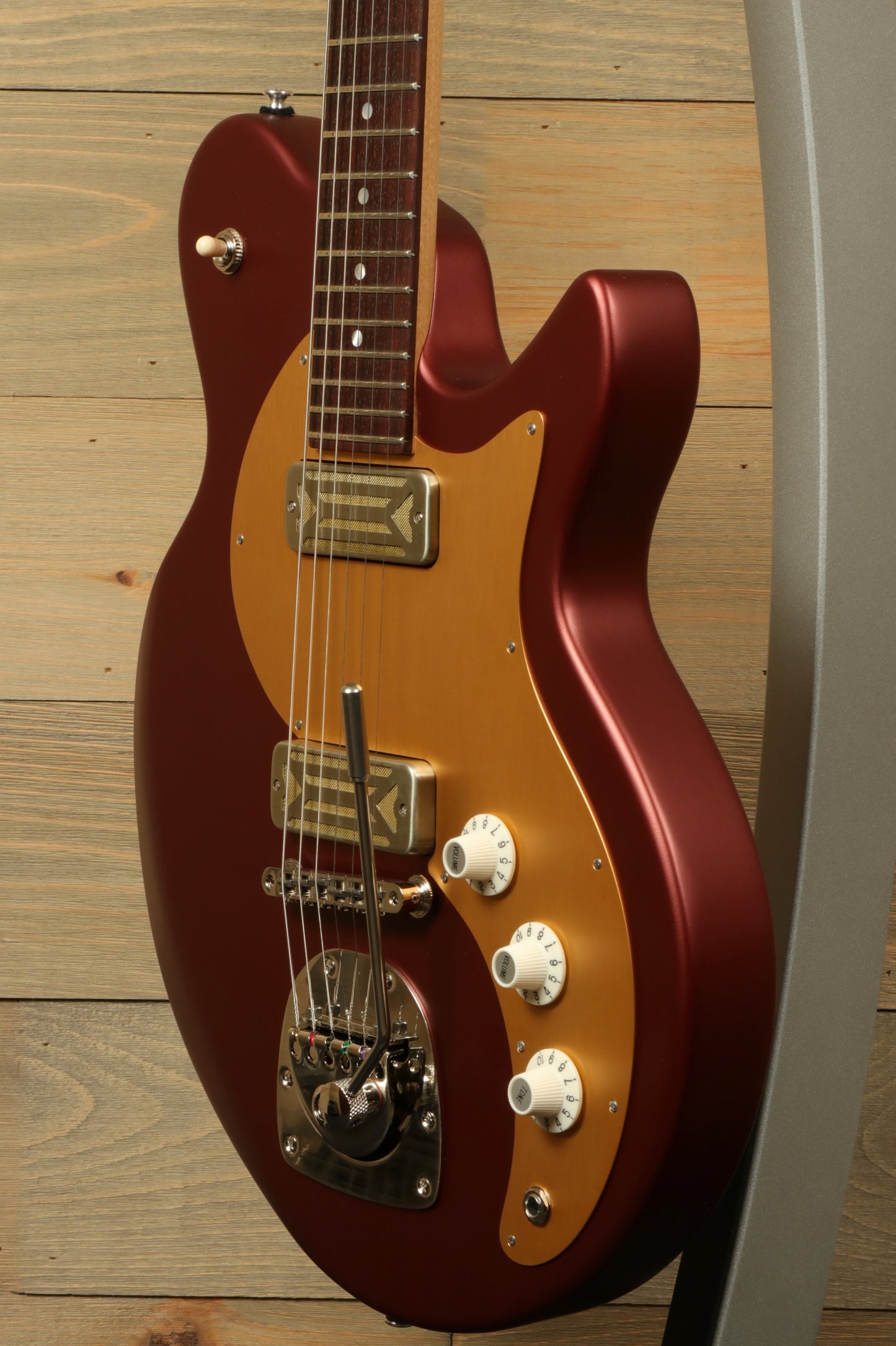 Eastman Fullertone Offset '62 with Vintage Red Finish, side view showcasing unique design and hardware