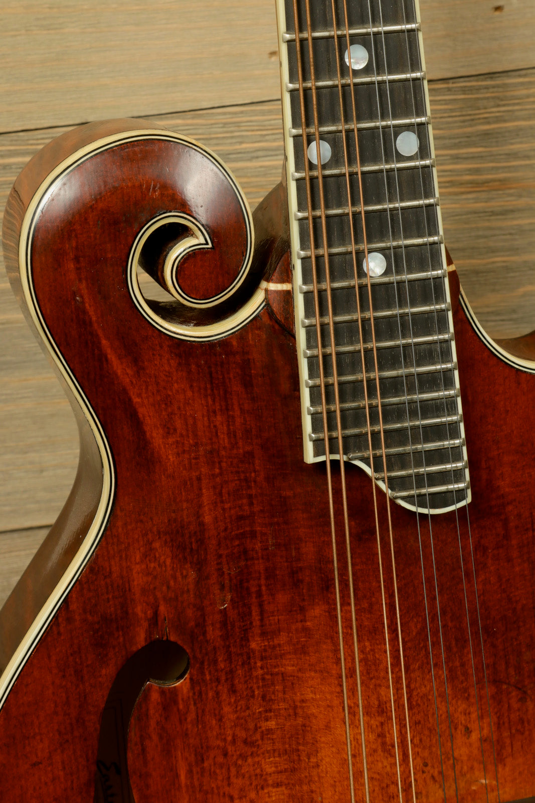 Eastman MD515/v mandolin with a detailed wood finish, front view, includes Hardshell Case - USED