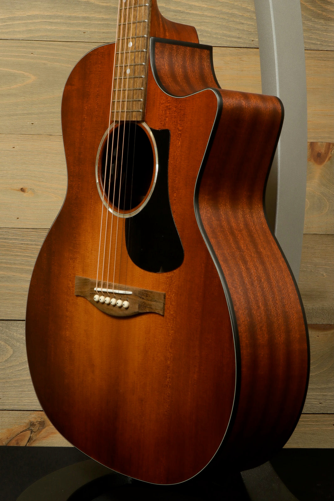 Eastman PCH1-GACE-CLA acoustic electric guitar in sunburst finish, side view on display