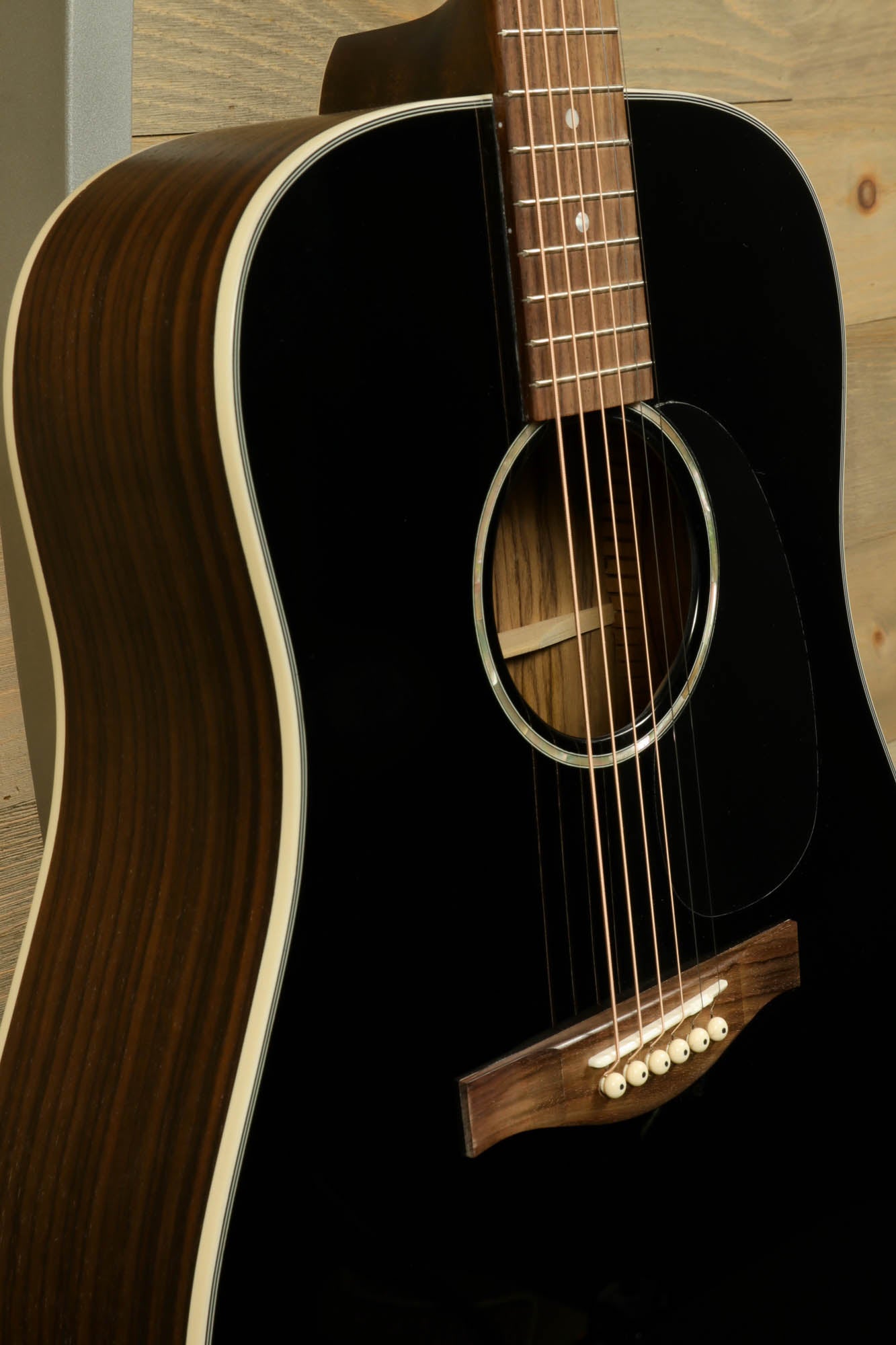Eastman PCH2-D-BK acoustic guitar in black finish with elegant wood details and smooth contours