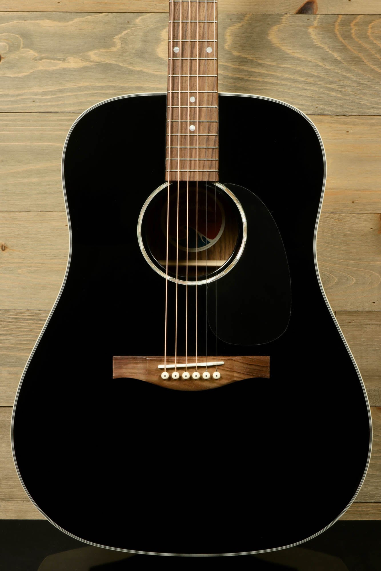 Eastman PCH2-D-BK acoustic guitar with a sleek black finish and rosewood bridge