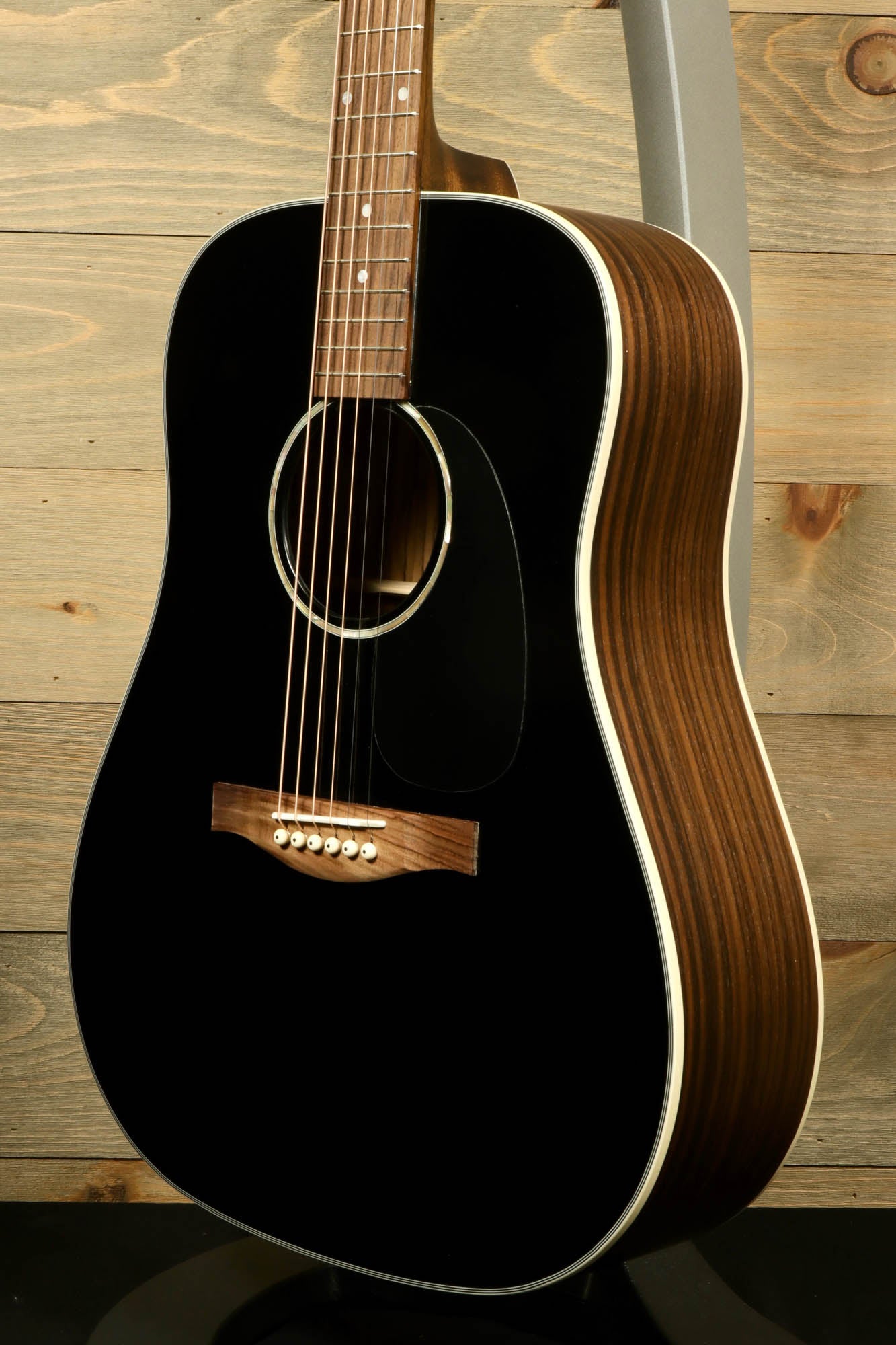 Eastman PCH2-D-BK acoustic guitar with a sleek black finish and natural wood accents