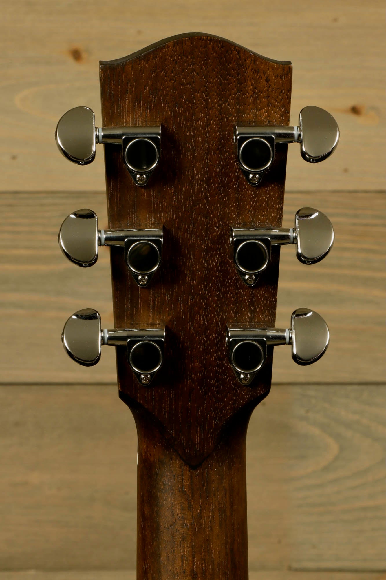 Close-up of Eastman PCH2-D-BK acoustic guitar headstock with chrome tuning pegs