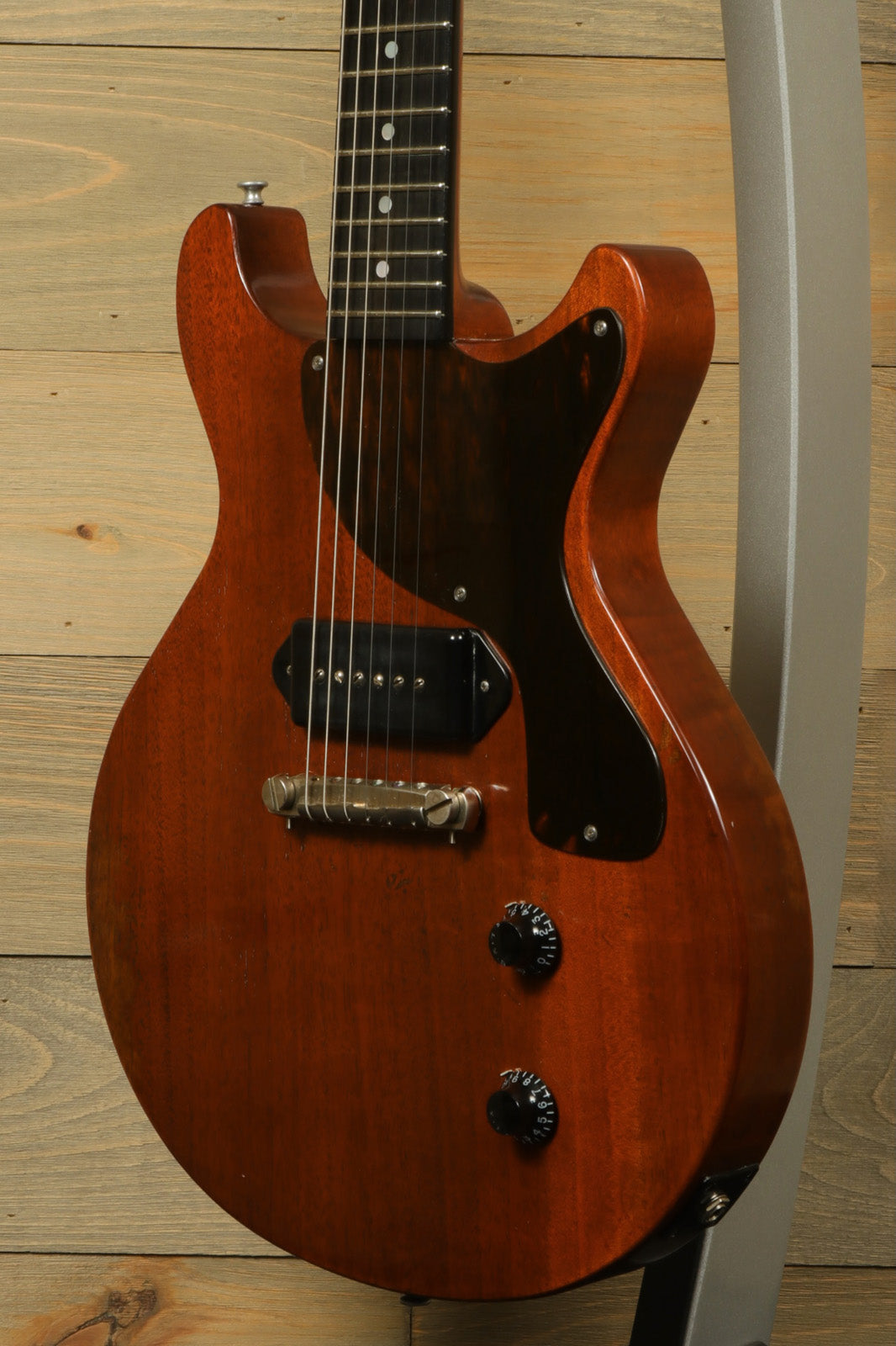 Eastman SB55DC/v electric guitar in natural finish, front view showcasing its classic design