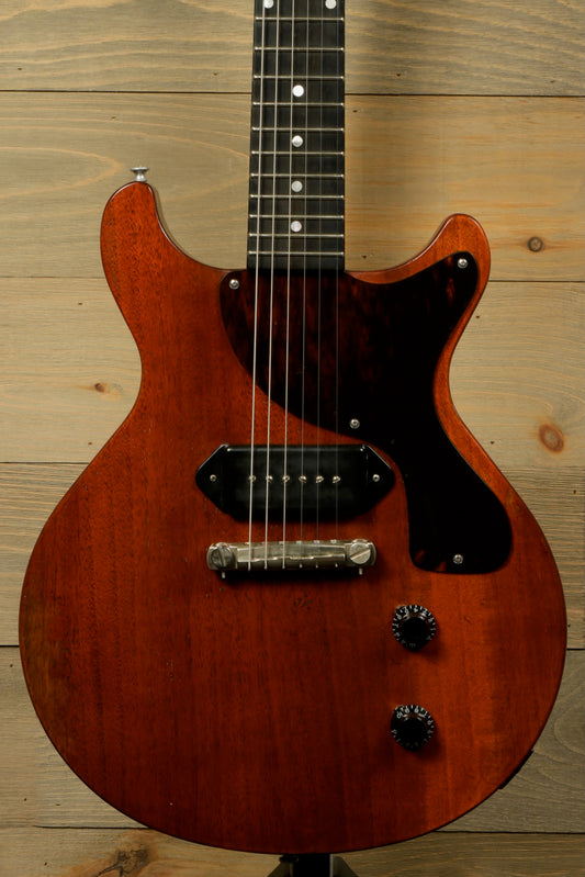 Eastman SB55DC/v electric guitar in natural finish, front view showcasing the body and pickups