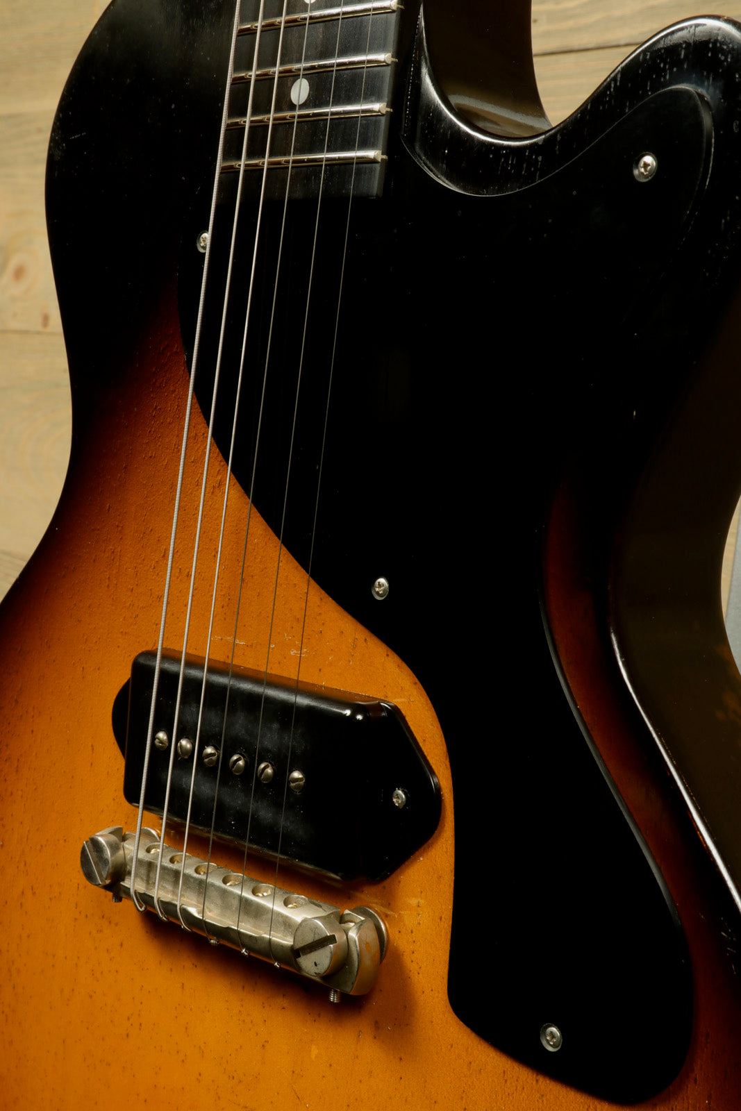 Eastman SB55/v-SB electric guitar in sunburst finish, front view showcasing the body and pickups