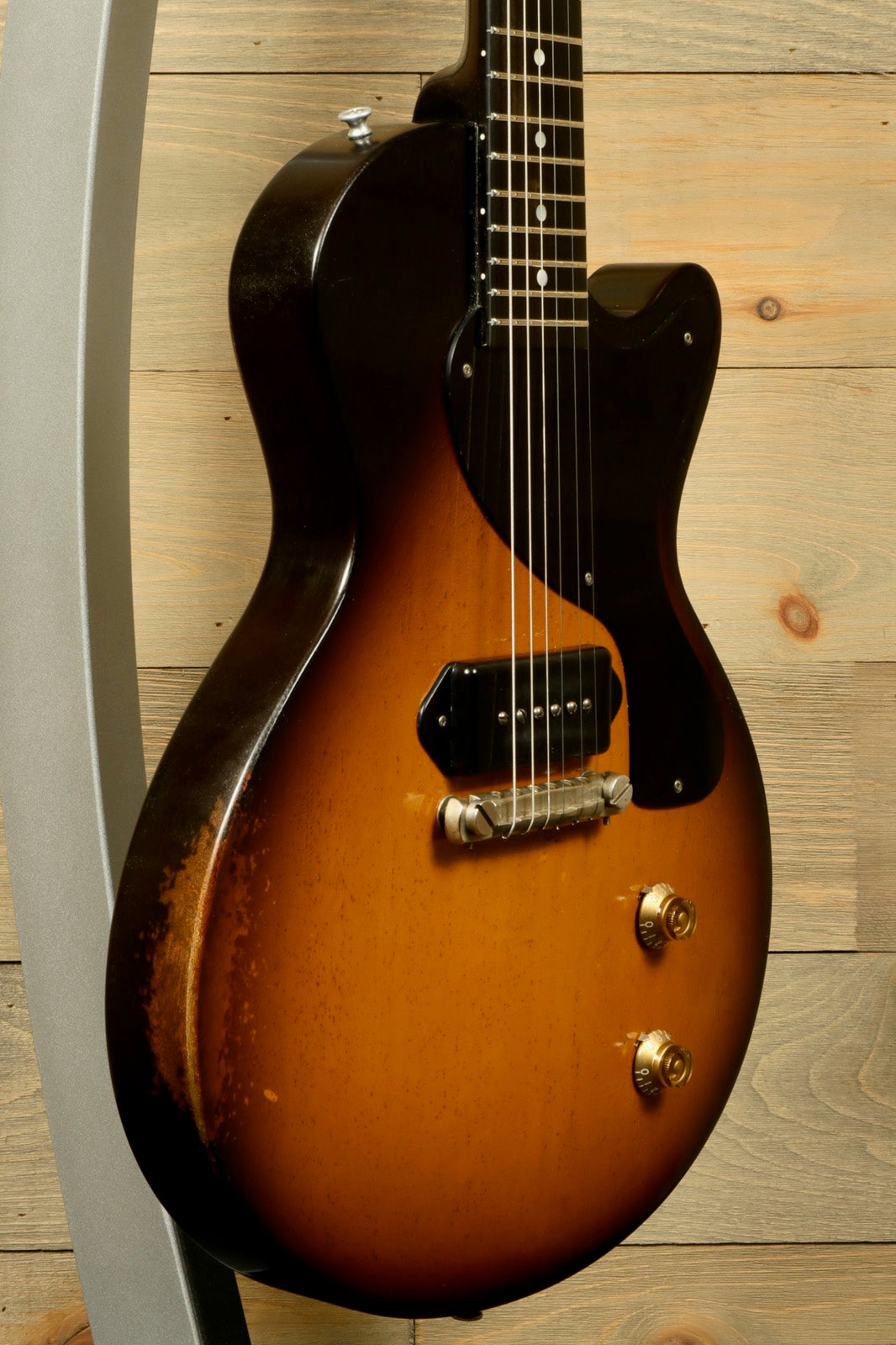 Eastman SB55/v-SB electric guitar in sunburst finish, side view showcasing its vintage design