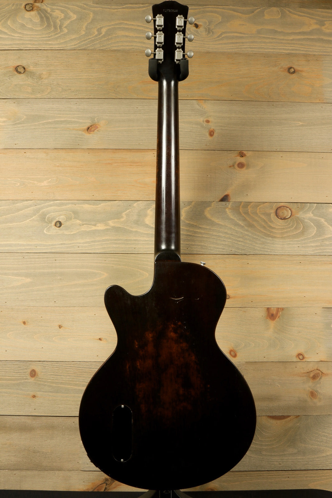Eastman SB55/v-SB electric guitar in dark brown, back view showcasing the smooth finish