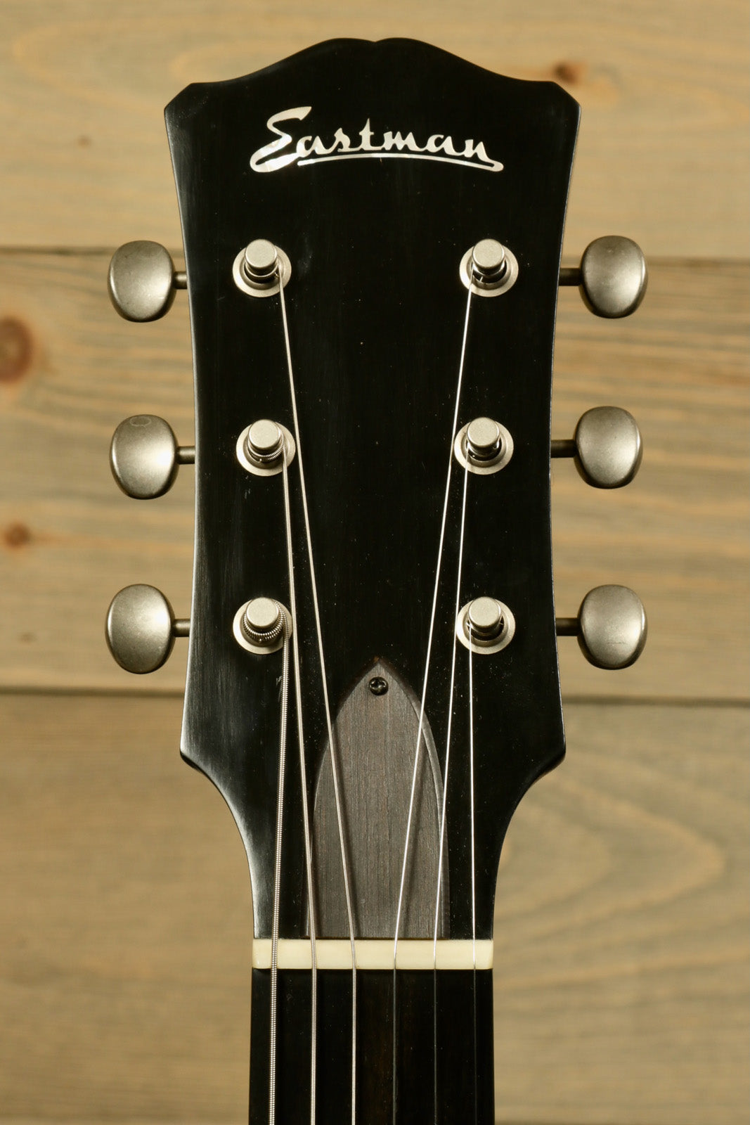 Eastman SB55/v-SB electric guitar, black finish, headstock view with tuning pegs