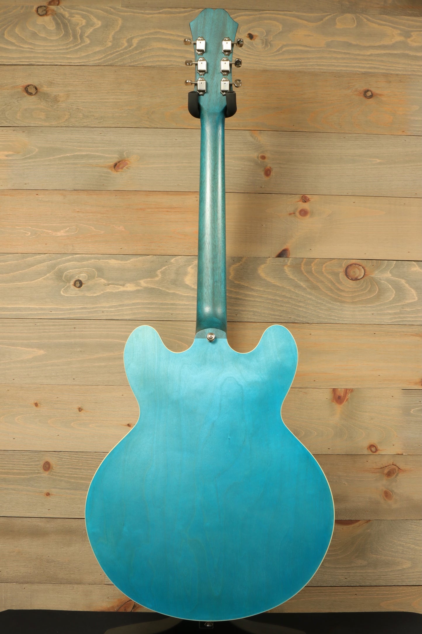 Epiphone Casino Worn electric guitar in blue, back view showcasing the sleek finish