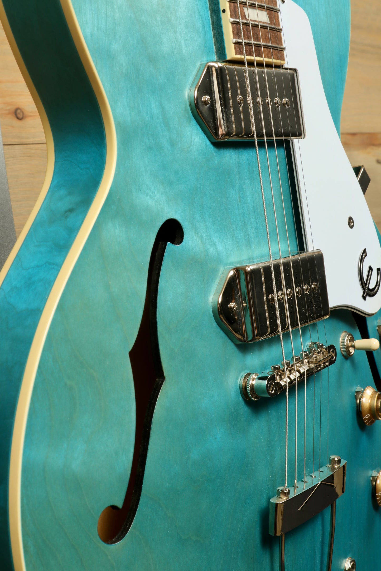 Epiphone Casino Worn blue finish, hollow body design, front view showcasing pickups and hardware