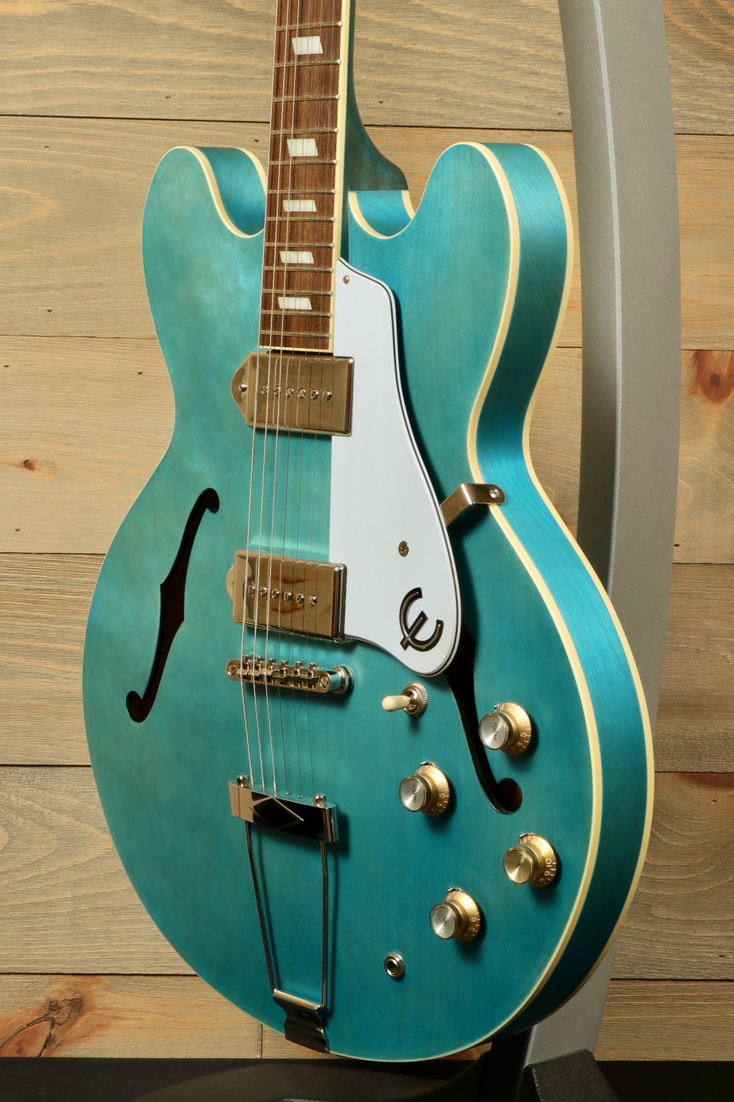 Epiphone Casino Worn turquoise hollow body electric guitar, front view with chrome hardware