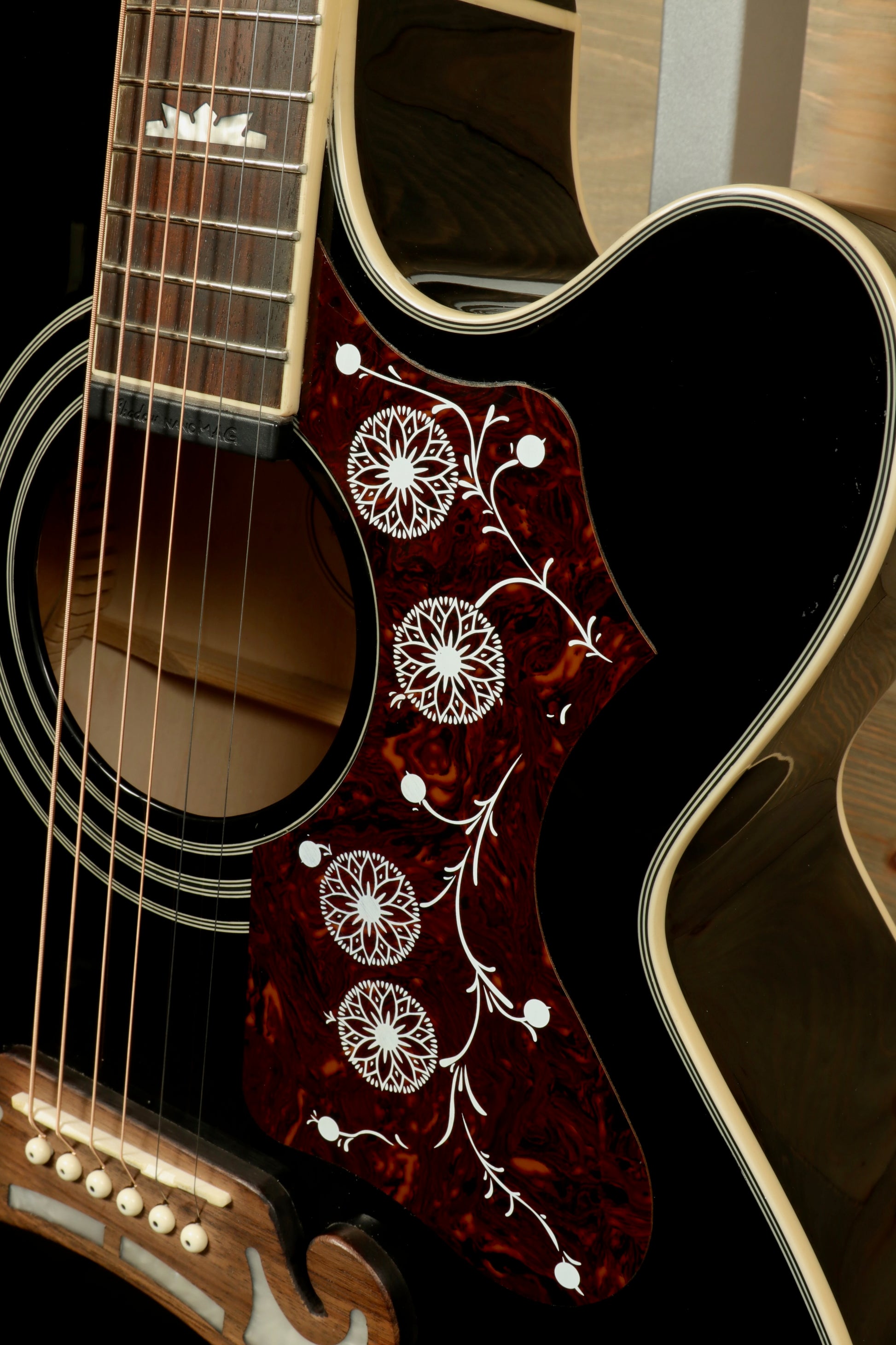 Close-up of Epiphone EJ200sce-BK USED Acoustic Electric Guitar with intricate floral inlay and glossy finish