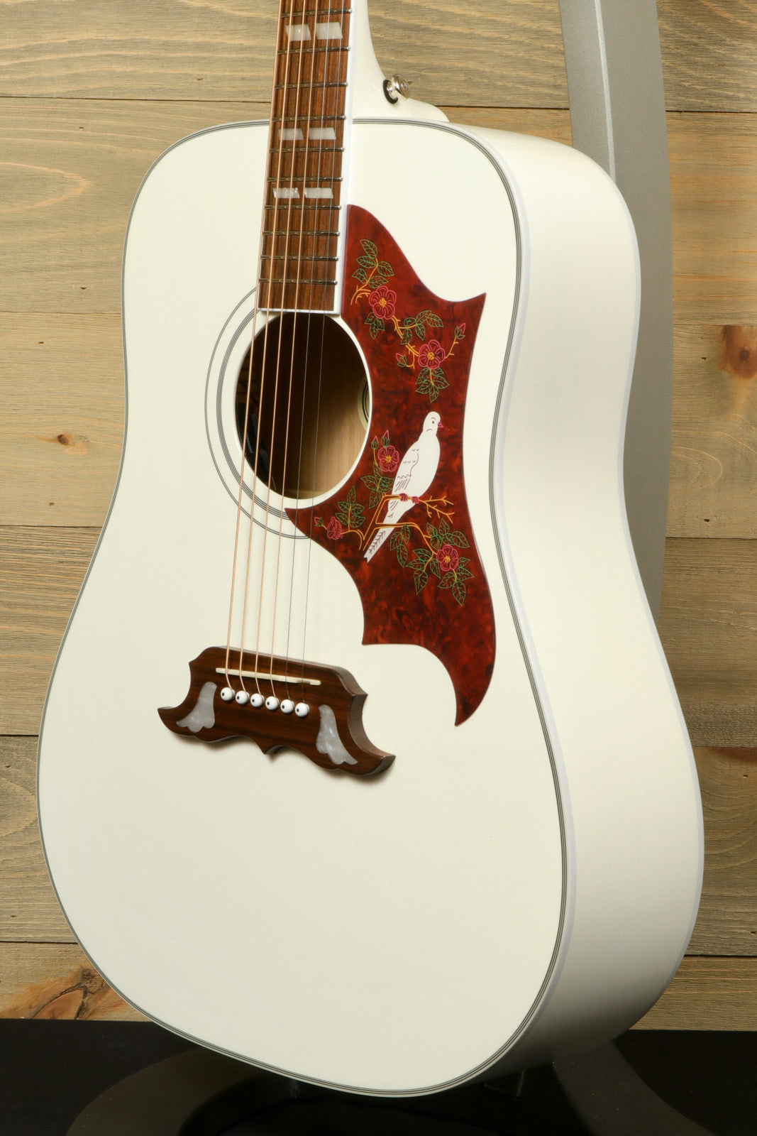 Epiphone Limited Edition Dove Pro Acoustic Electric Guitar with intricate floral inlays and unique body shape