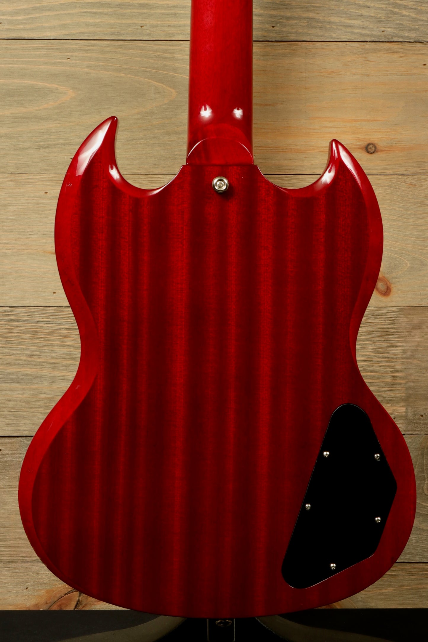 Epiphone SG Pro Left cherry red, back view showcasing the smooth finish and contours