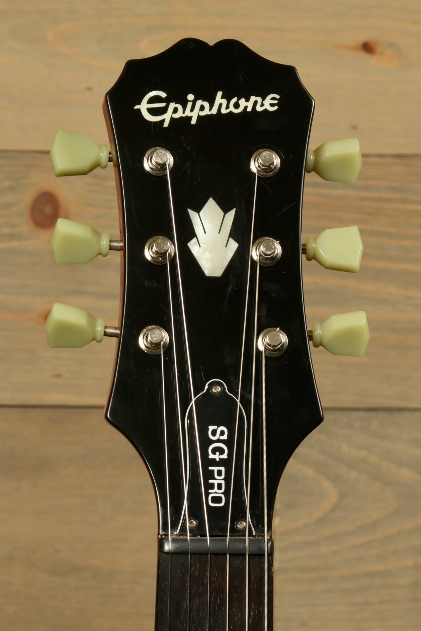 Epiphone SG Pro Left electric guitar, black headstock with tuning pegs, front view