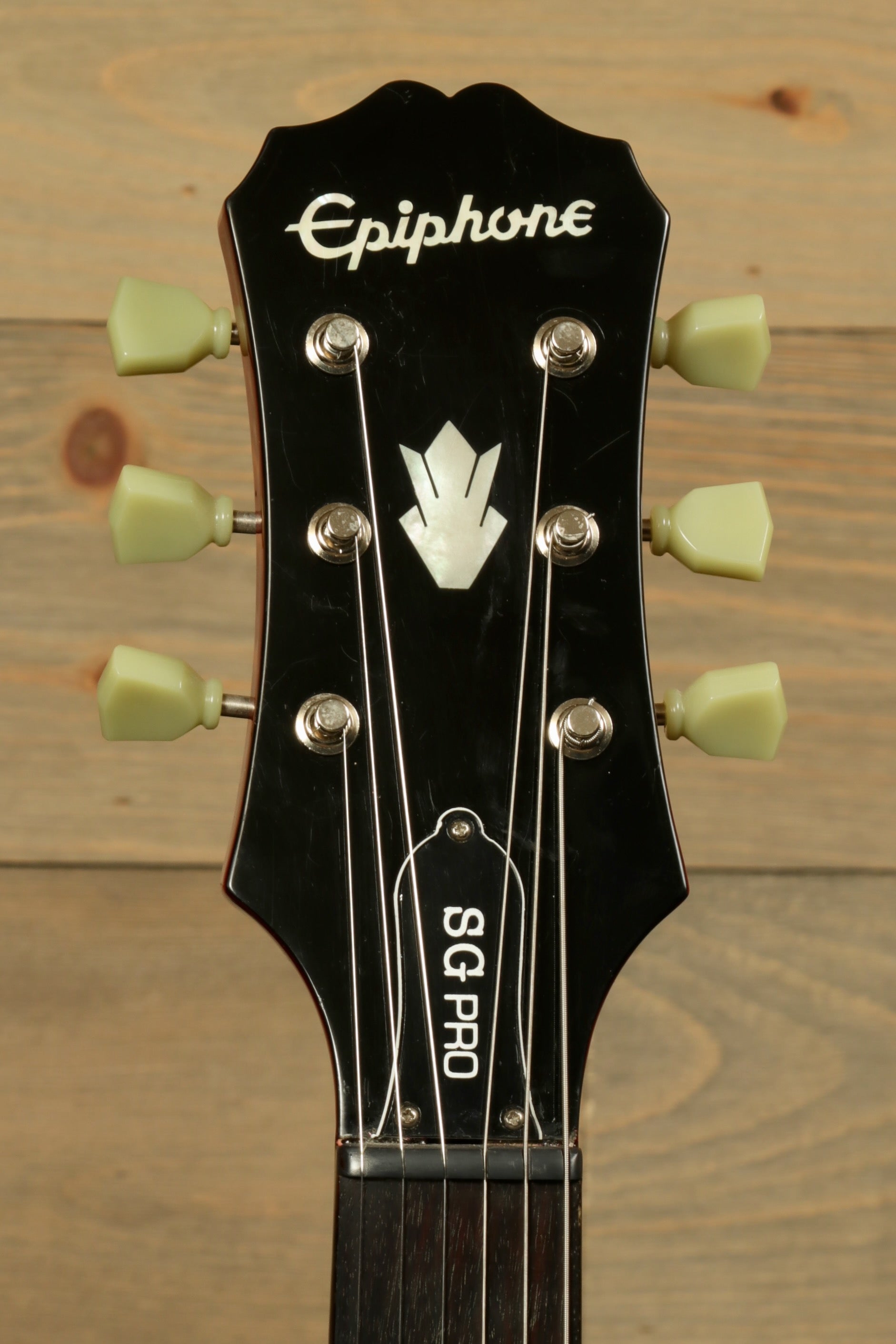 Epiphone SG Pro Left electric guitar, black headstock with tuning pegs, front view