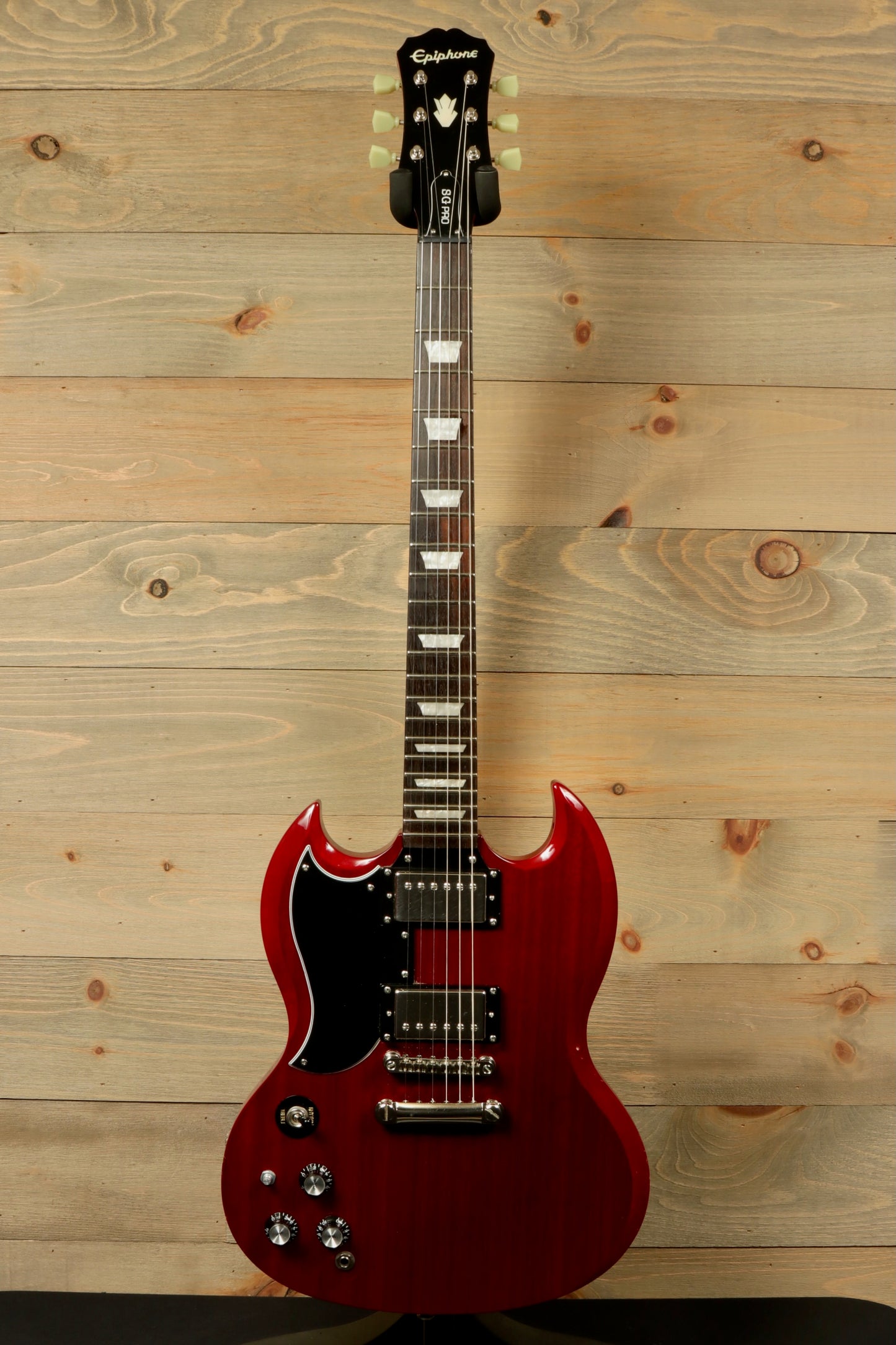 Epiphone SG Pro Left electric guitar in cherry red, front view with classic double-cutaway design