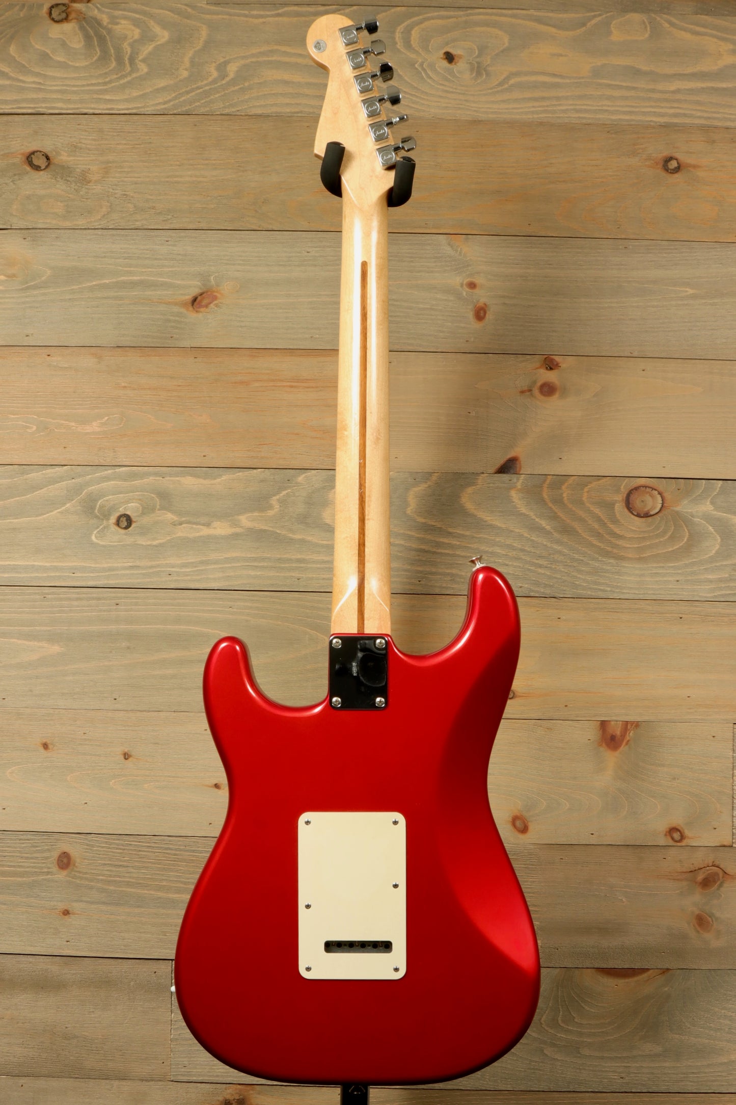 2006 Fender Standard Stratocaster with Hardshell Case USED featuring a sleek red finish and smooth maple neck