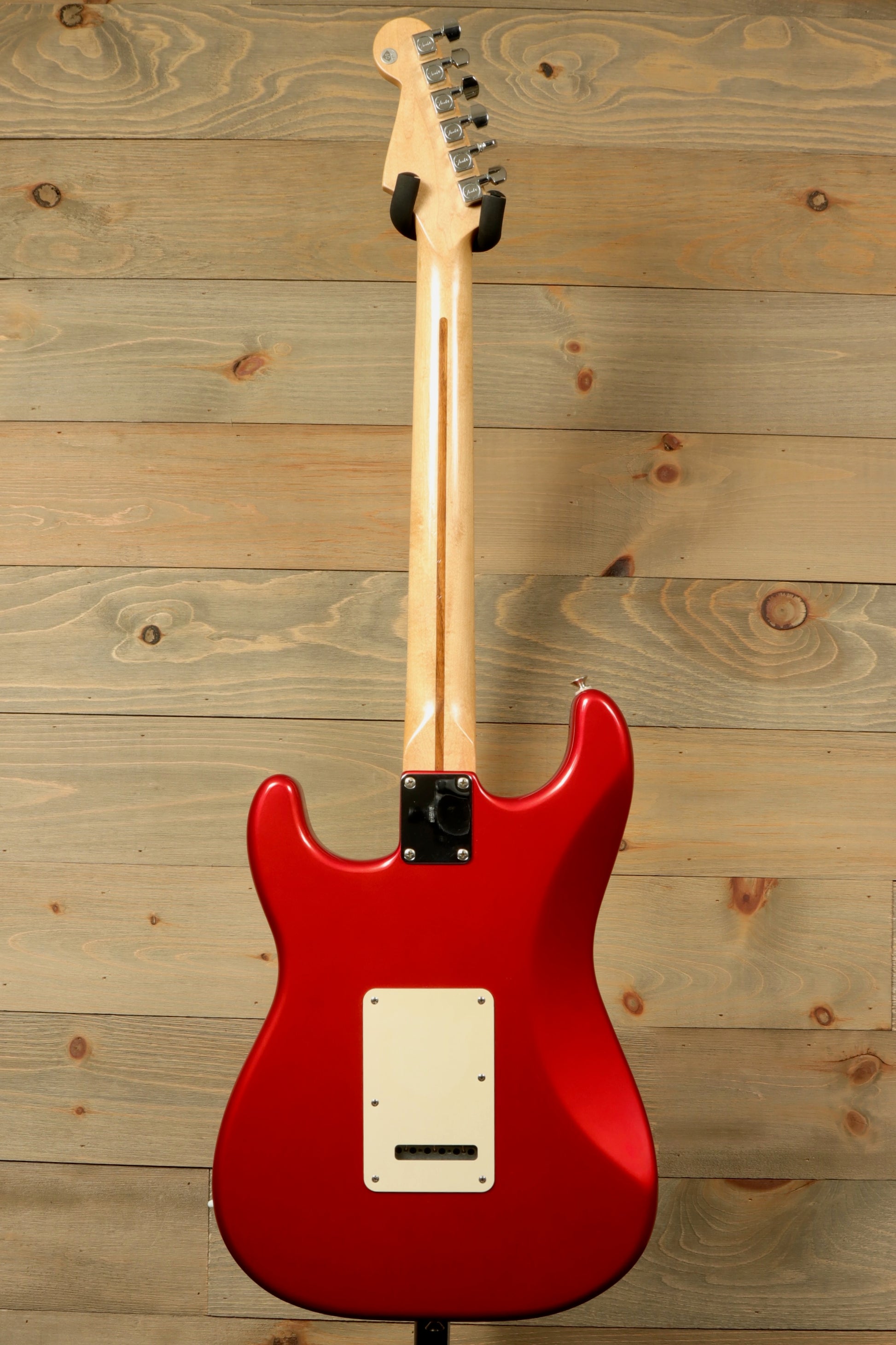 2006 Fender Standard Stratocaster with Hardshell Case USED featuring a sleek red finish and smooth maple neck