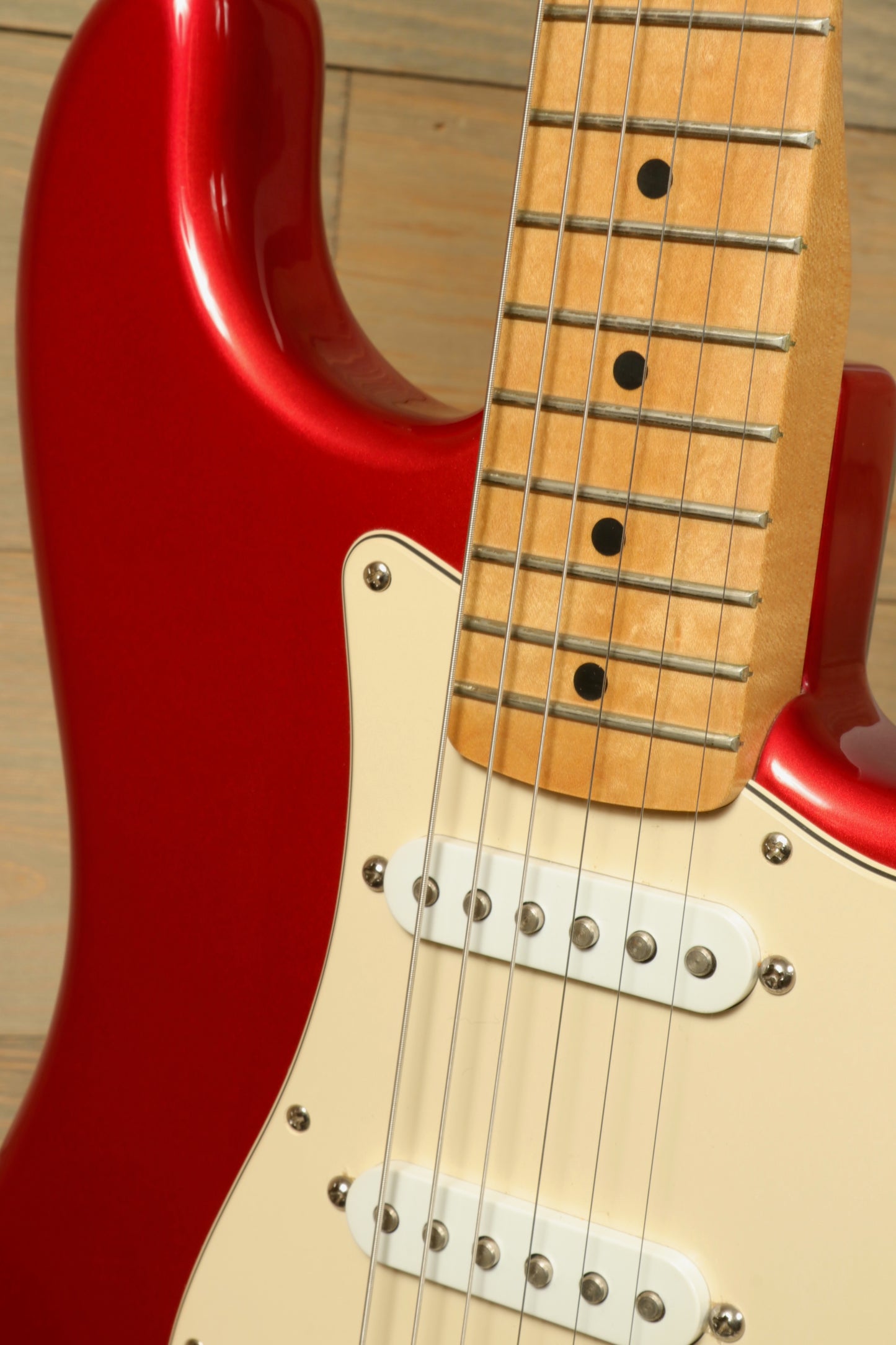 2006 Fender Standard Stratocaster with Hardshell Case USED in red finish showcasing the body and fretboard