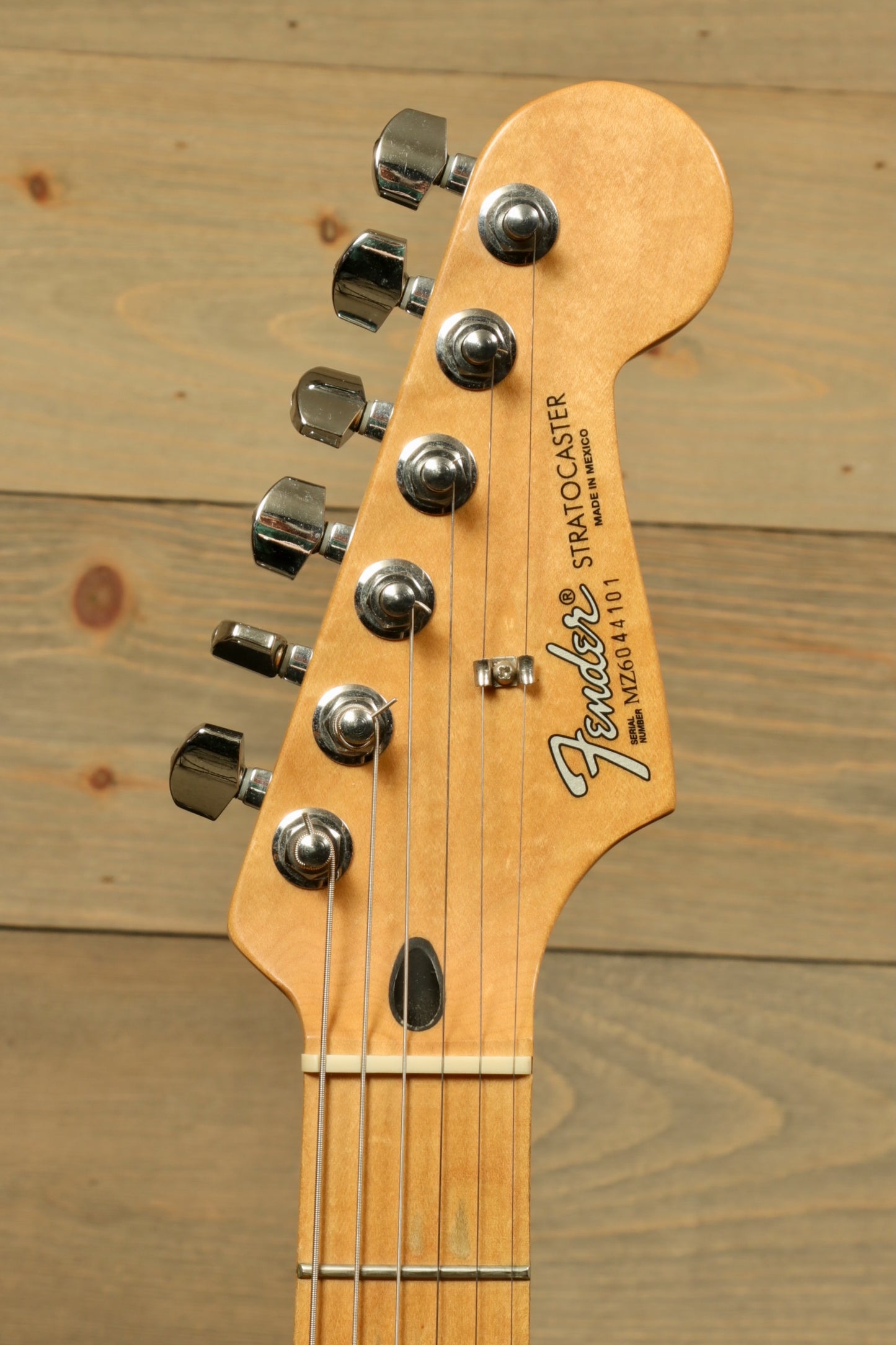 2006 Fender Standard Stratocaster with Hardshell Case USED featuring classic tuning pegs and a smooth neck