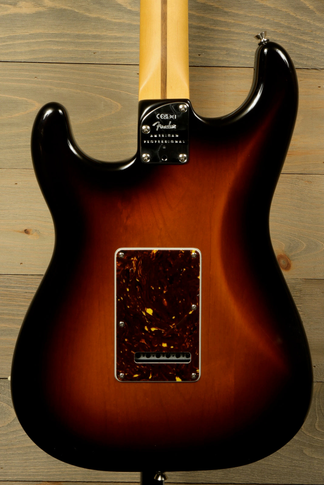 Back view of Fender American Professional II Stratocaster with Hardshell Case showcasing its sunburst finish and sleek design