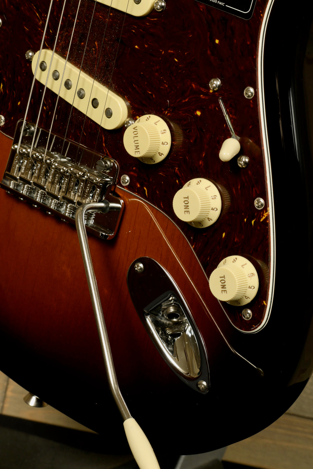 Fender American Professional II Stratocaster with Hardshell Case featuring stylish controls and a sunburst finish