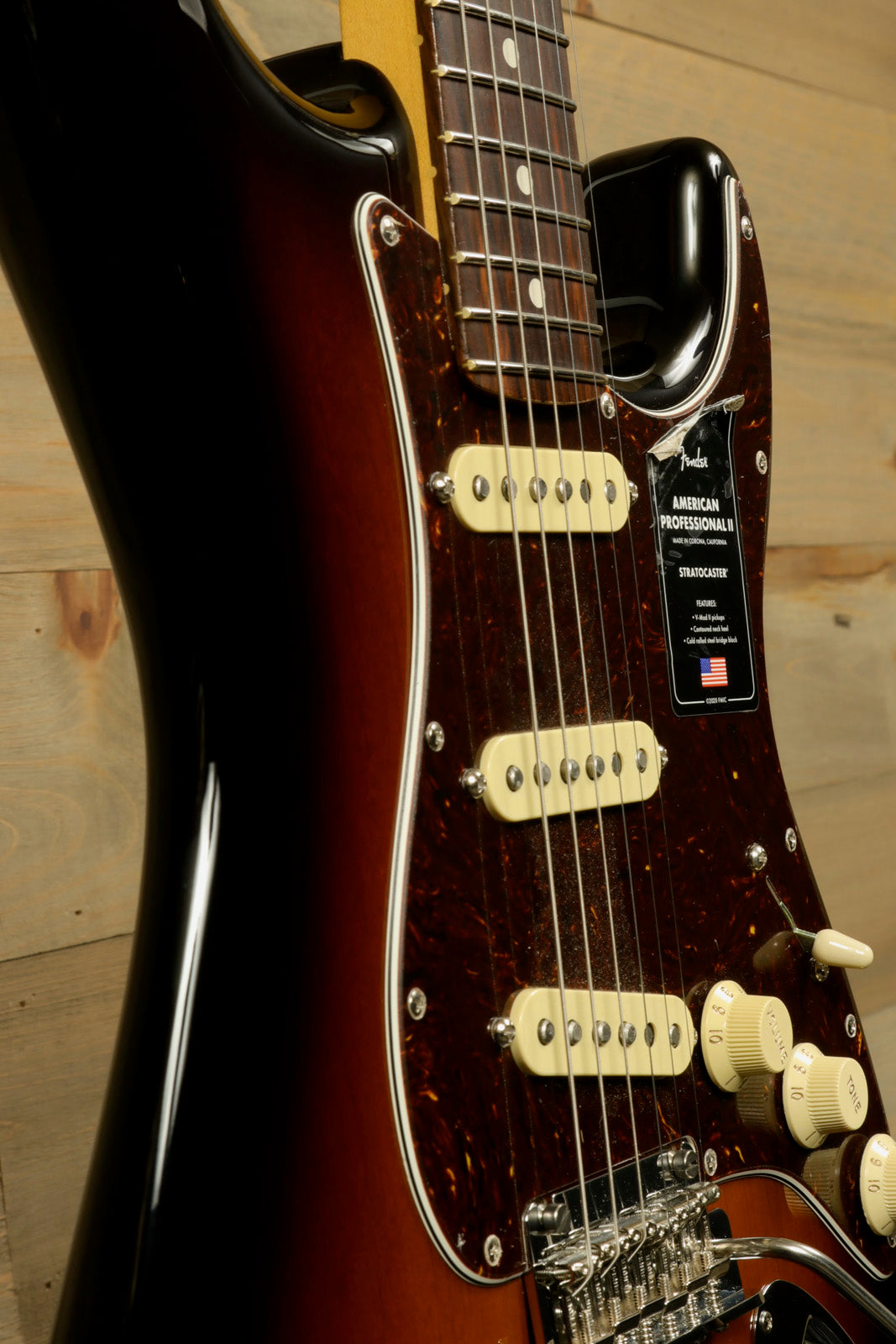 Fender American Professional II Stratocaster with Hardshell Case featuring a sunburst finish and three pickups