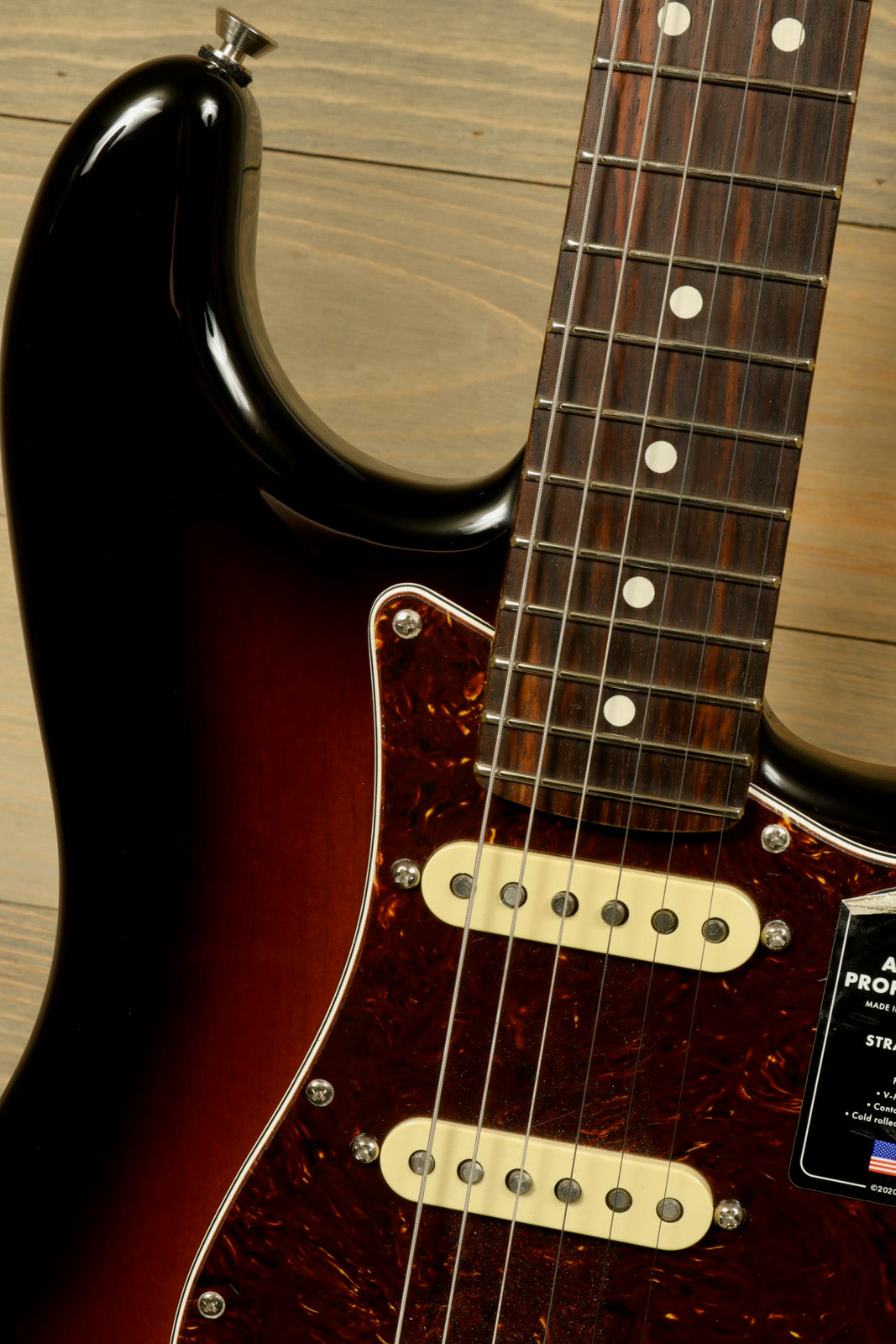 Fender American Professional II Stratocaster with Hardshell Case showcasing elegant sunburst finish and classic design
