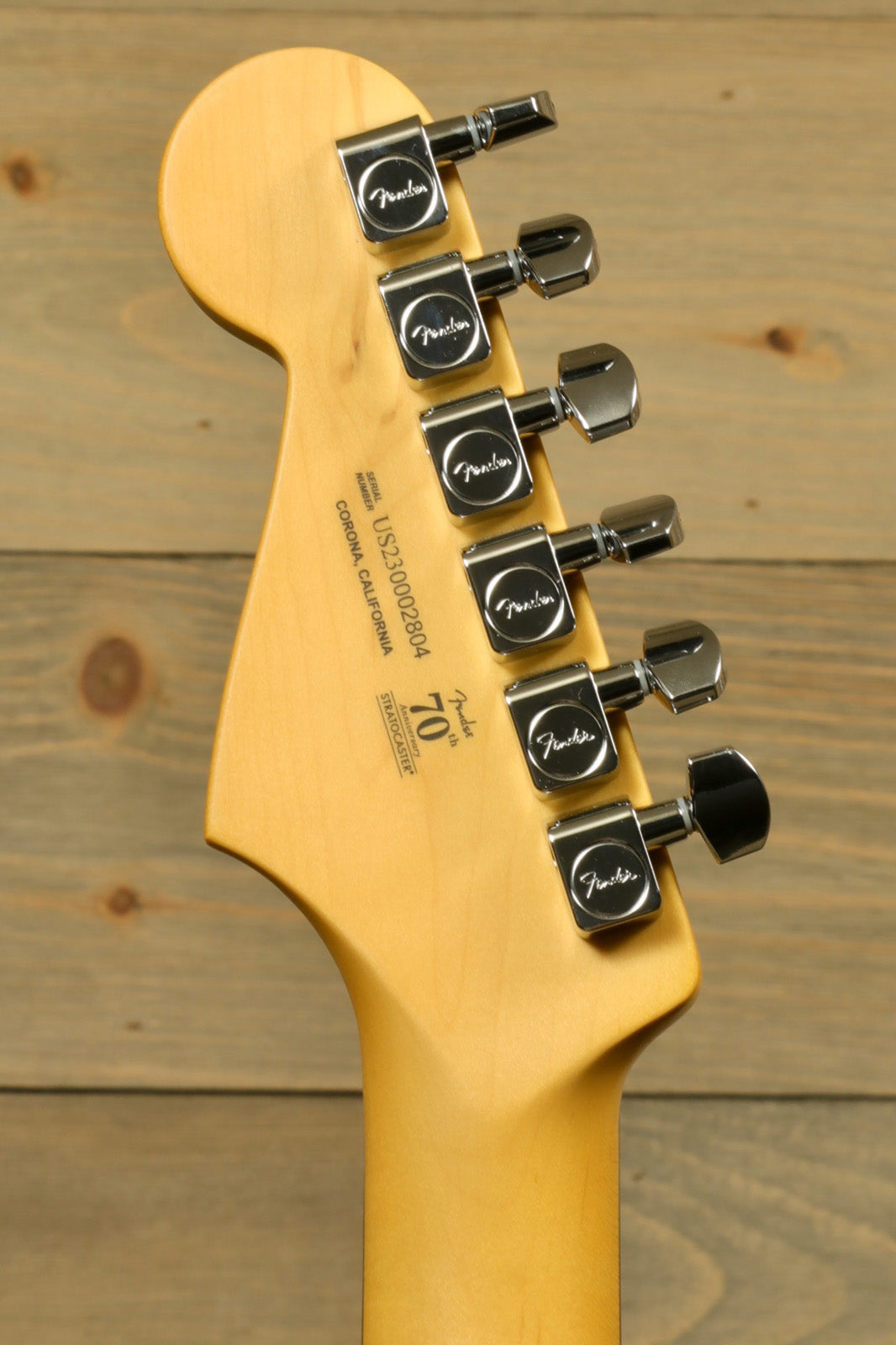 Fender American Professional II Stratocaster with Hardshell Case, featuring a sleek headstock and tuning pegs