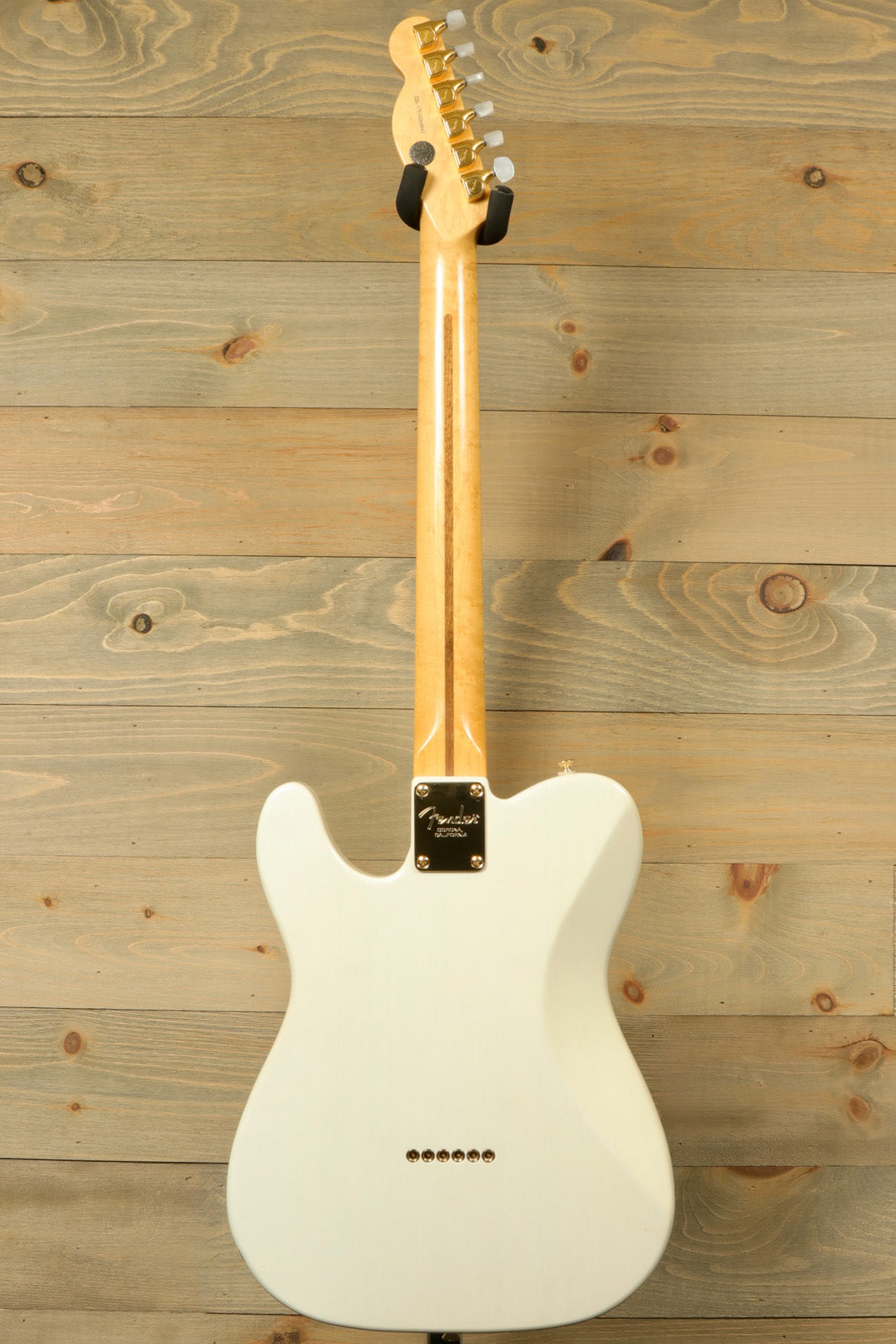Fender Limited Edition Select Light Ash Telecaster in white, back view showcasing the smooth finish
