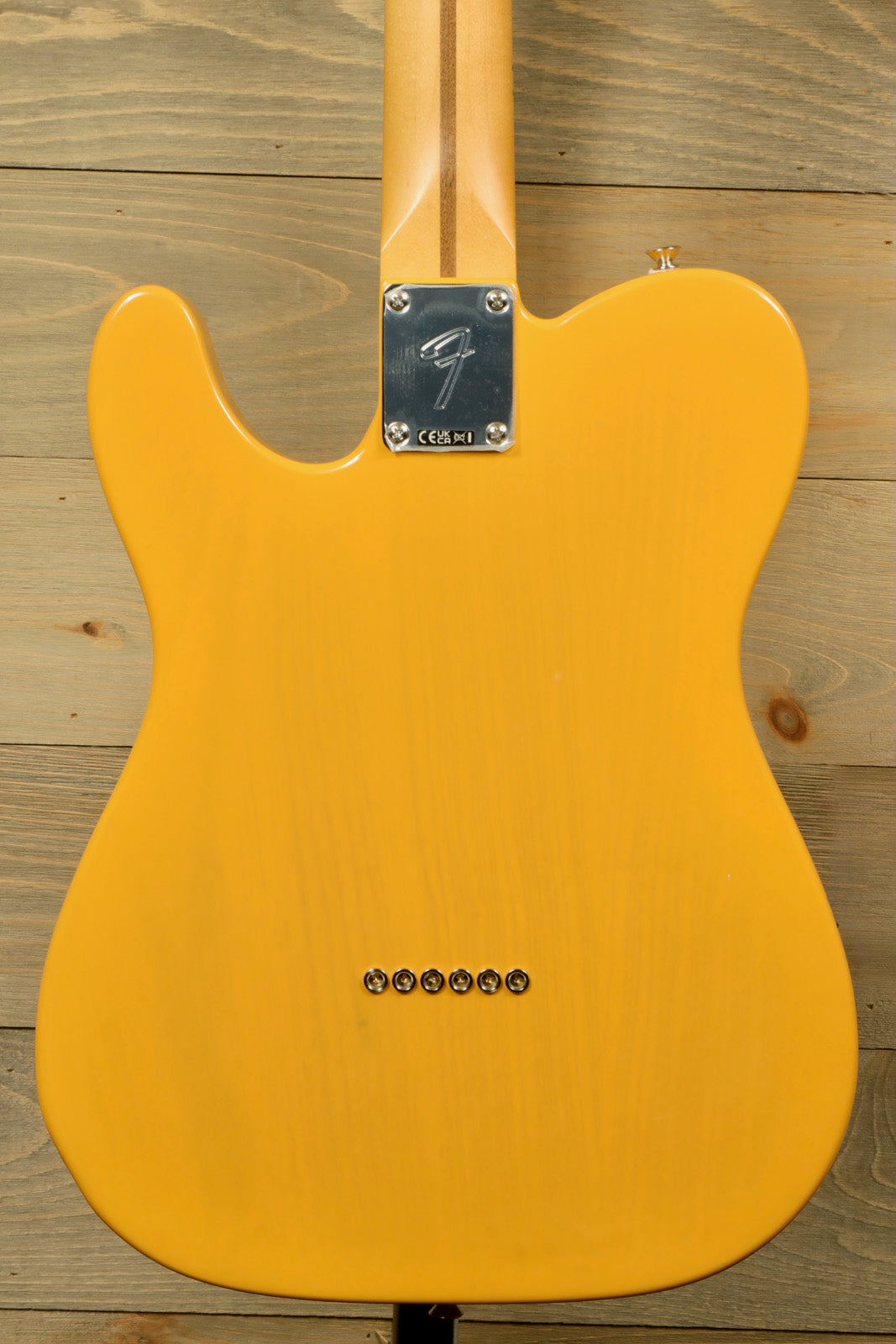 Fender Player II Telecaster in a glossy yellow finish, back view showcasing the body shape.