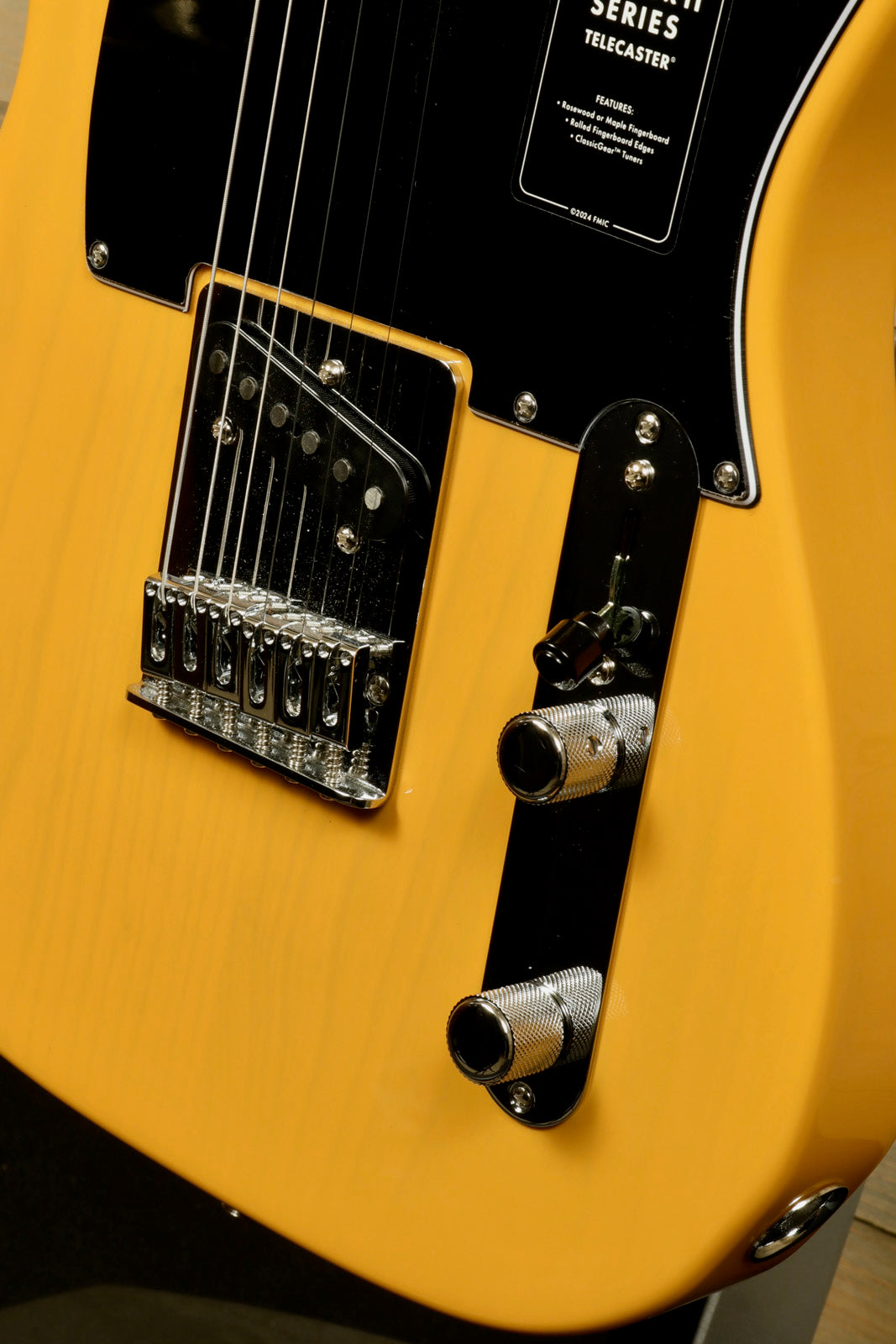Fender Player II Telecaster in Butterscotch Blonde, close-up view of body and control panel