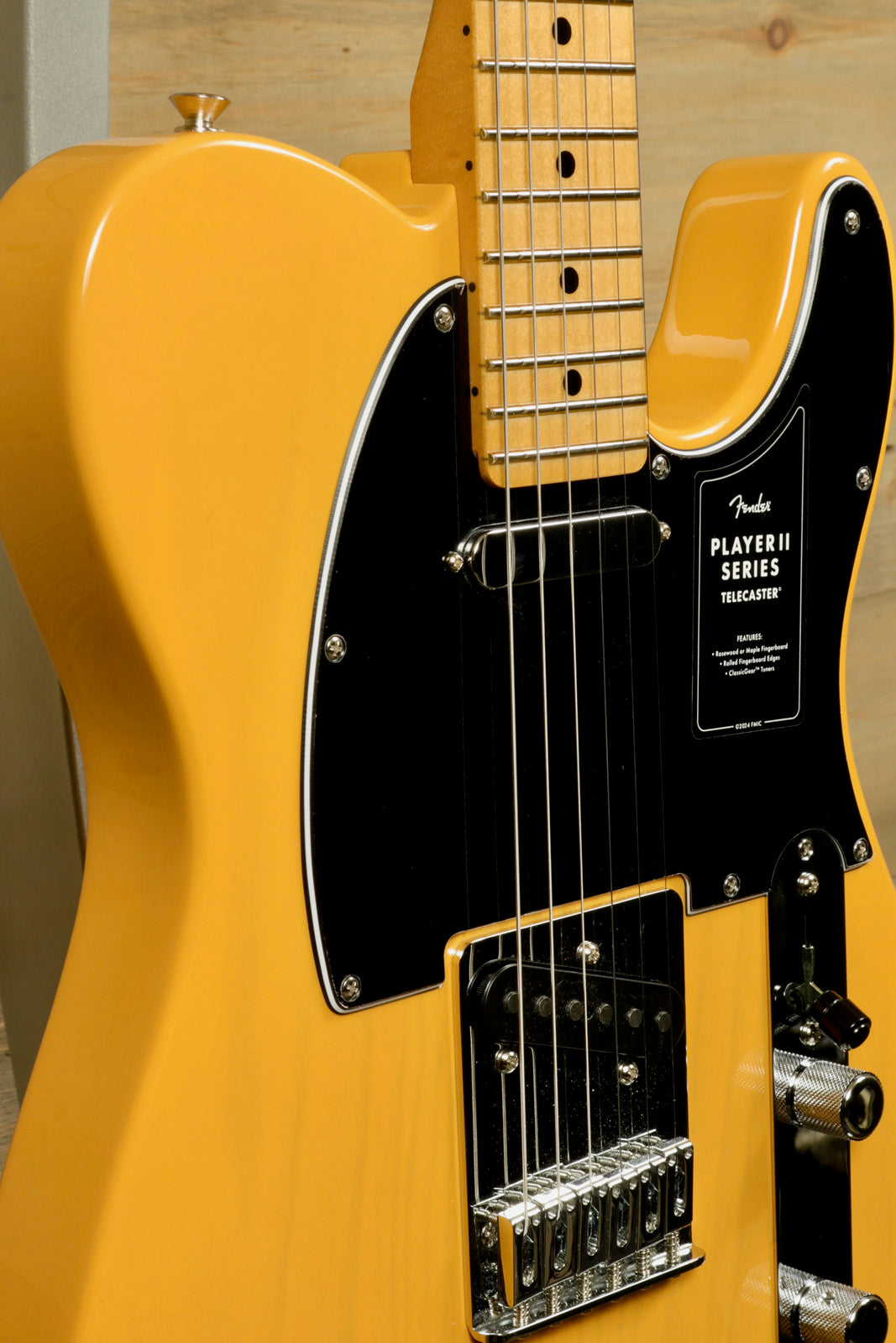 Fender Player II Telecaster in Butterscotch with Maple Neck, side view showcasing body and pickups