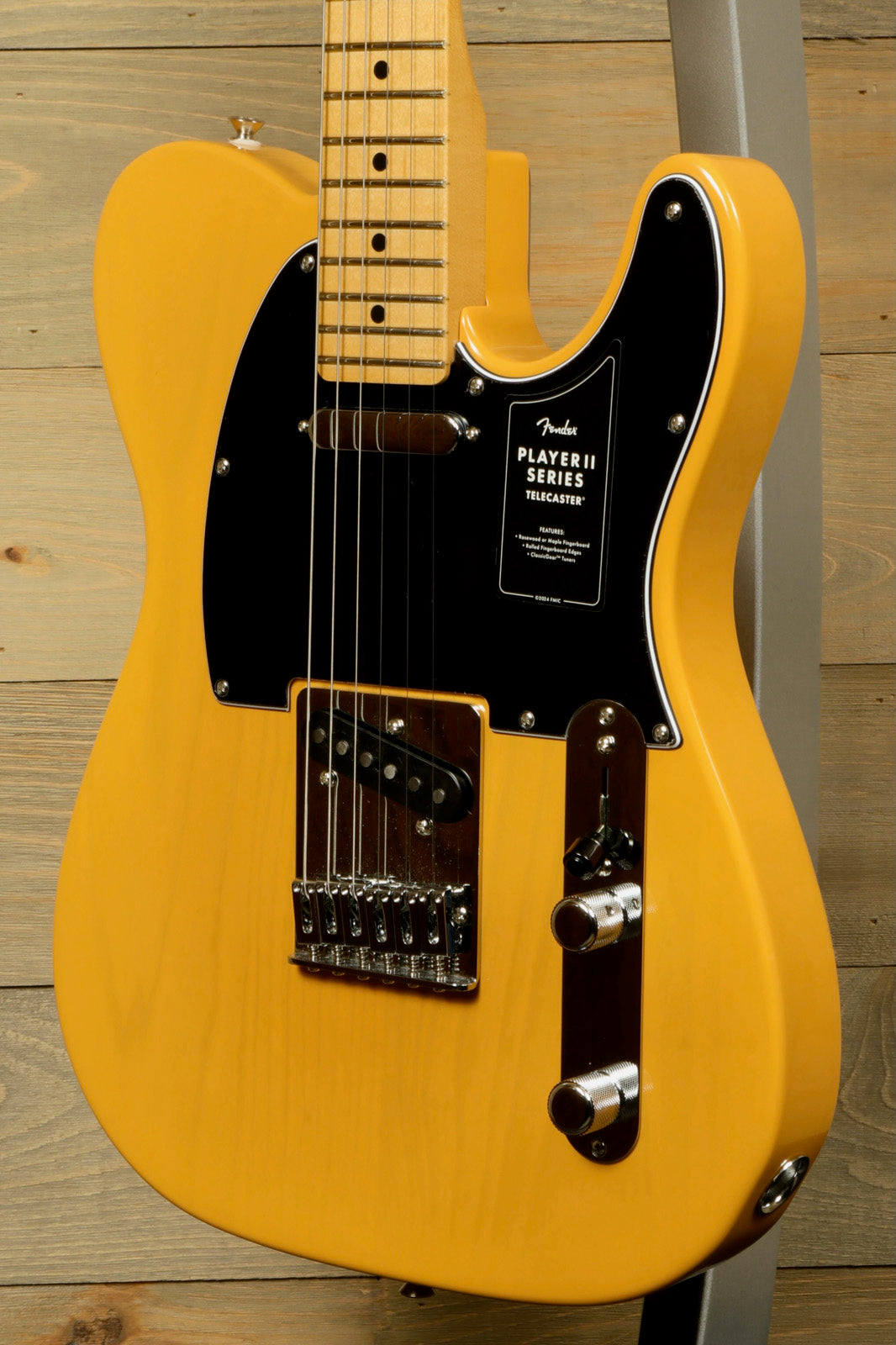 Fender Player II Telecaster in buttercream yellow, front view showcasing the body and neck