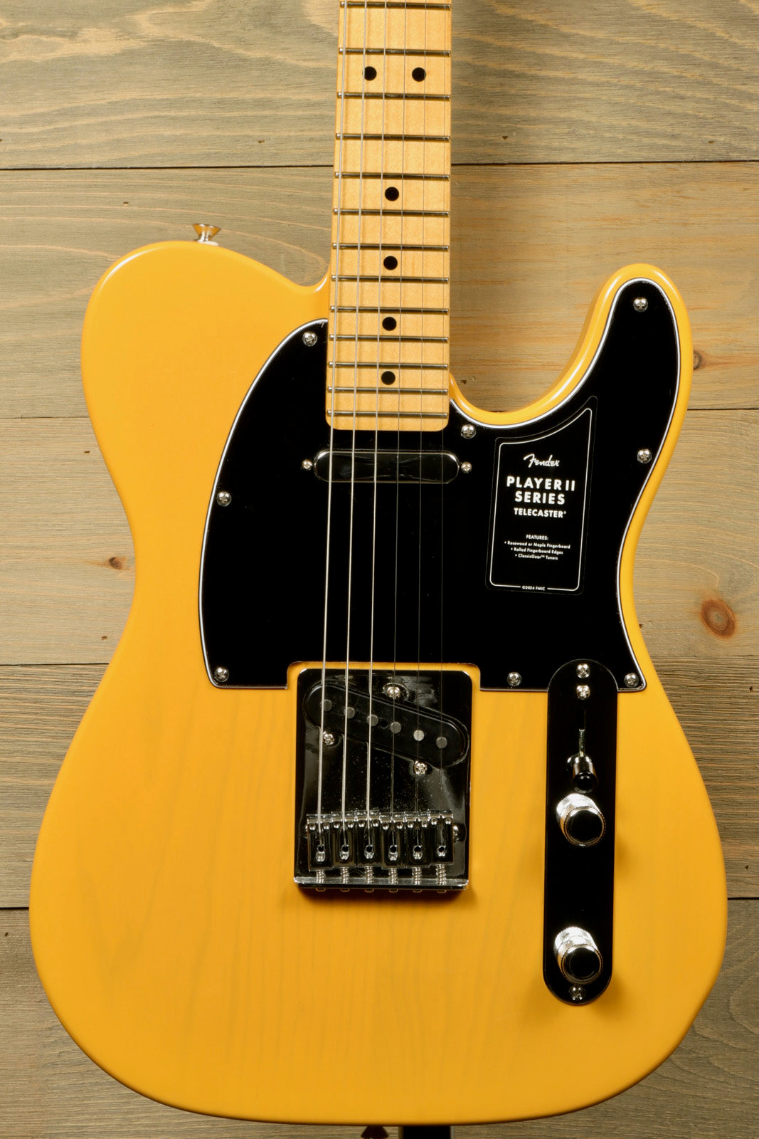 Fender Player II Telecaster in butterscotch yellow, front view showcasing the black pickguard