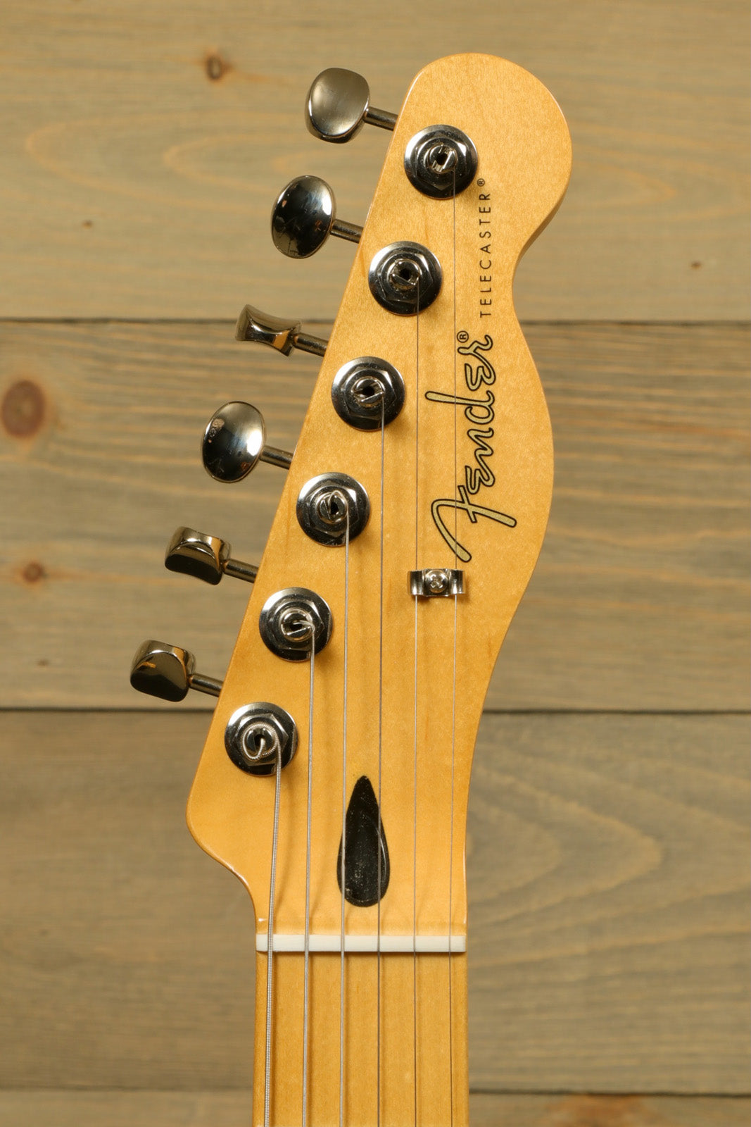 Fender Player II Telecaster natural finish, headstock with tuning pegs, close-up view