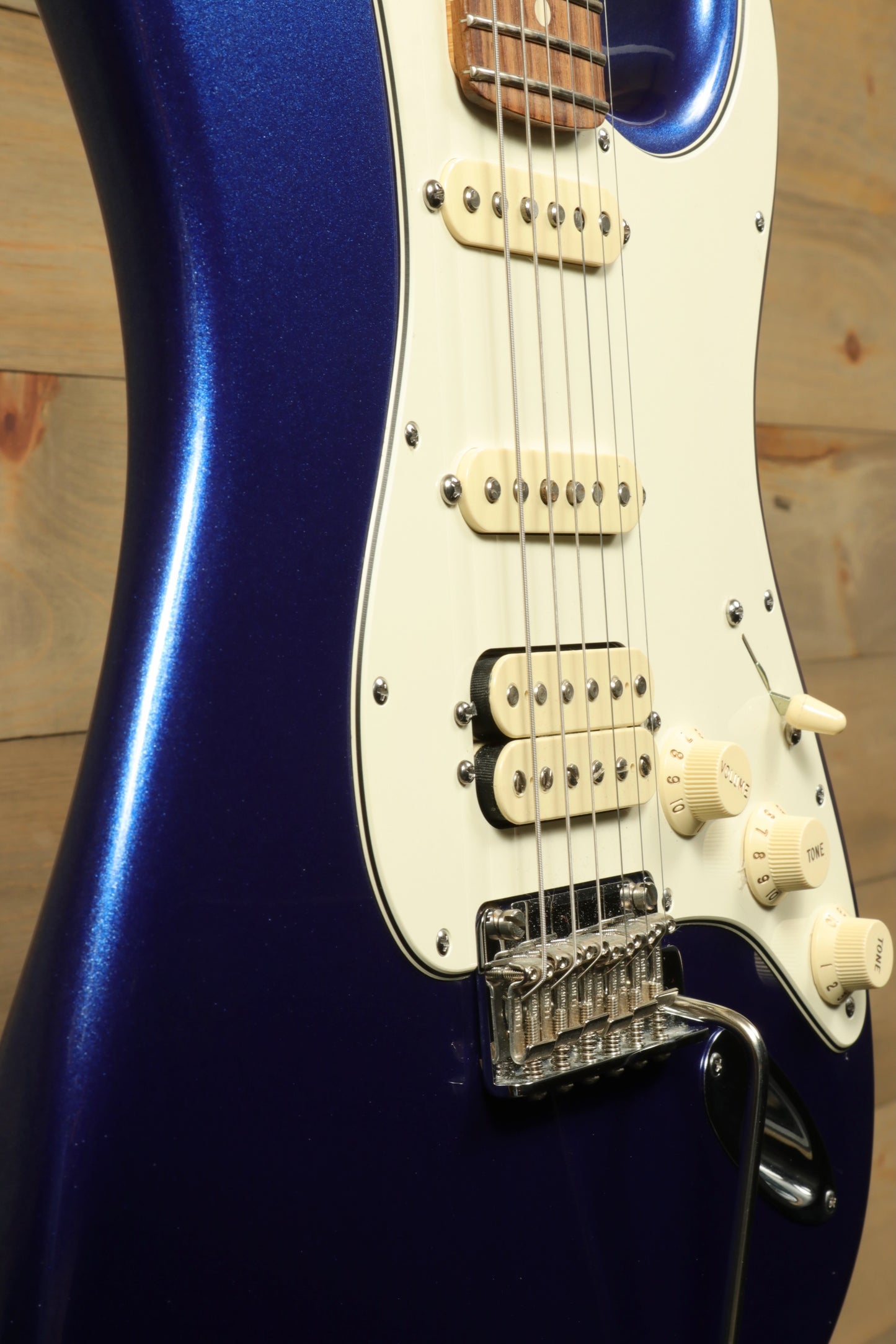Used Fender American Standard Stratocaster HSS in blue finish with white pickguard and chrome hardware