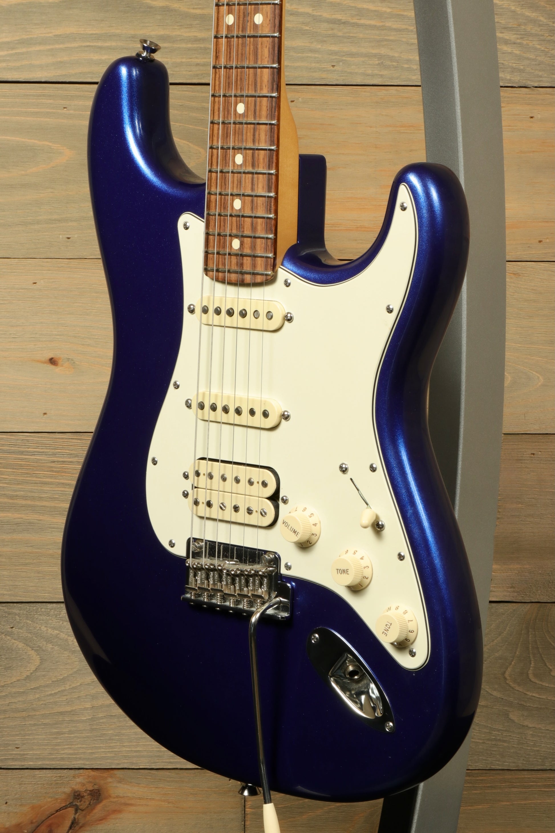 Used Fender American Standard Stratocaster HSS in blue finish with traditional styling and versatile sound